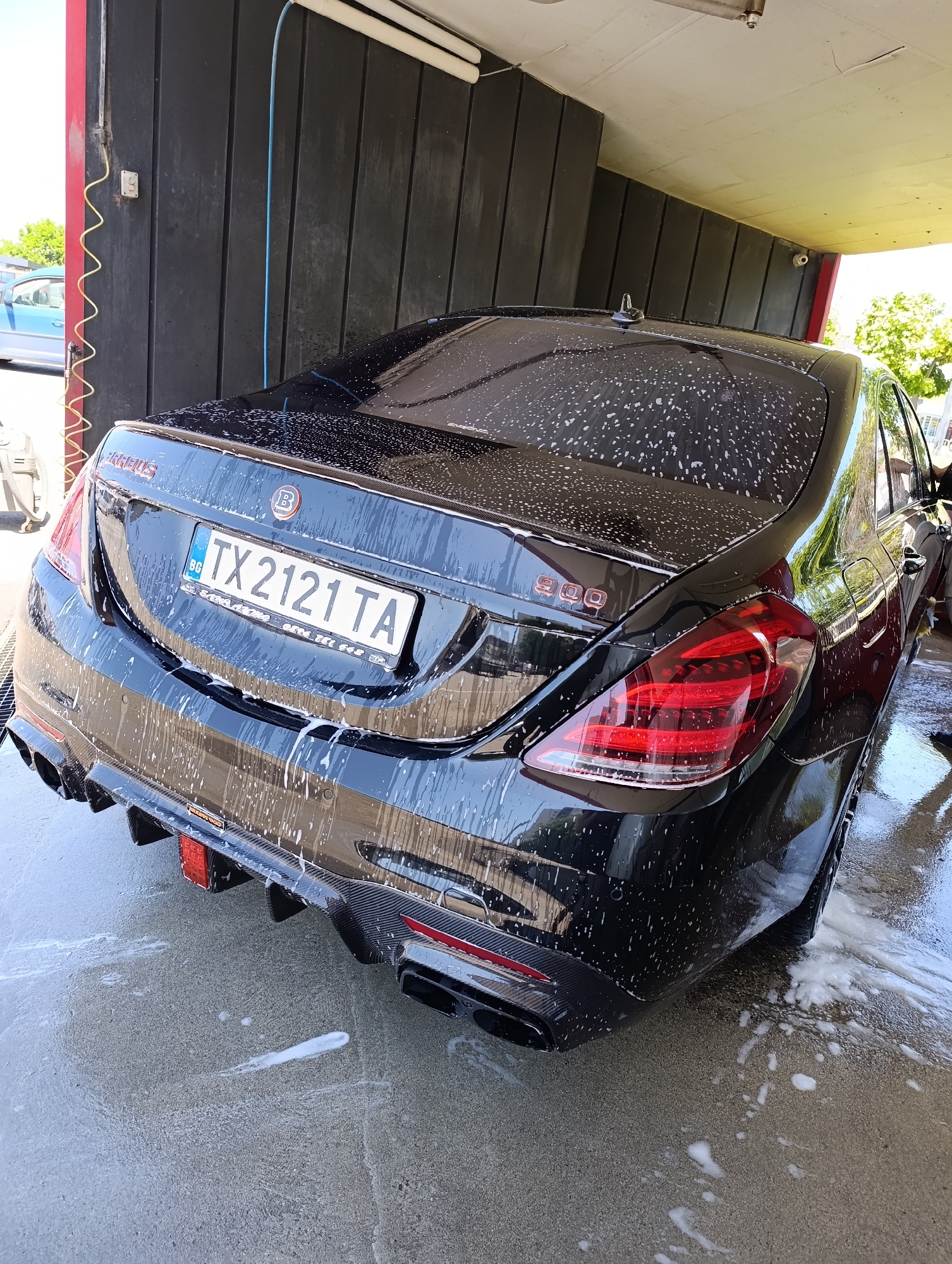 Multiple vehicles getting washed at a Dobrich self-service car wash