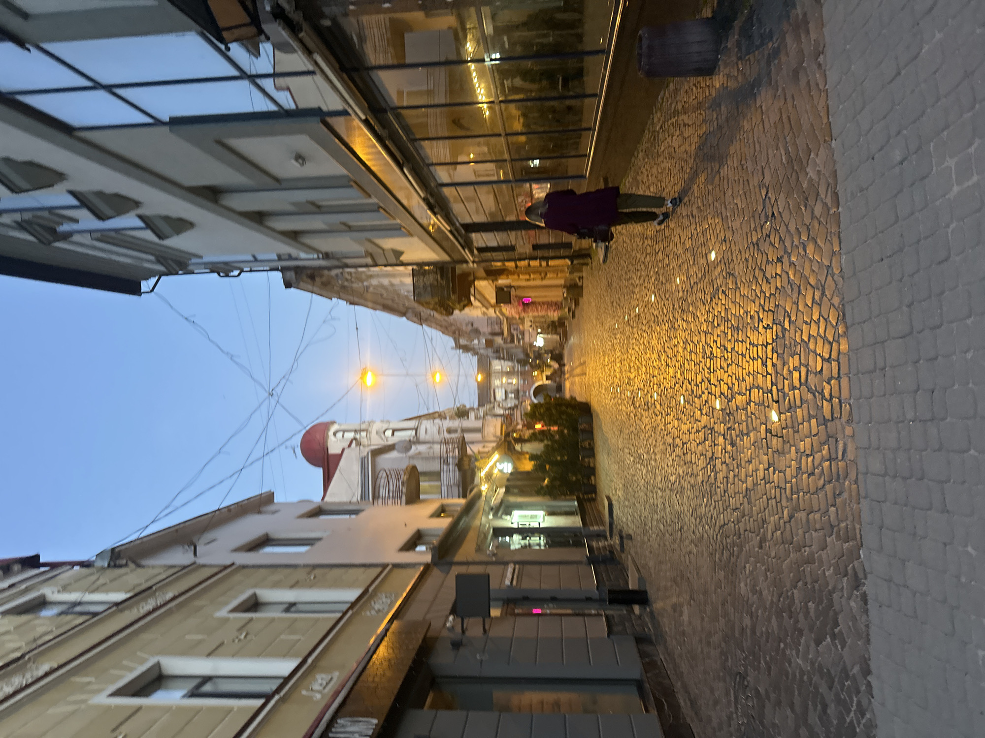 Ternopil city center at dusk, streets and squares winding down