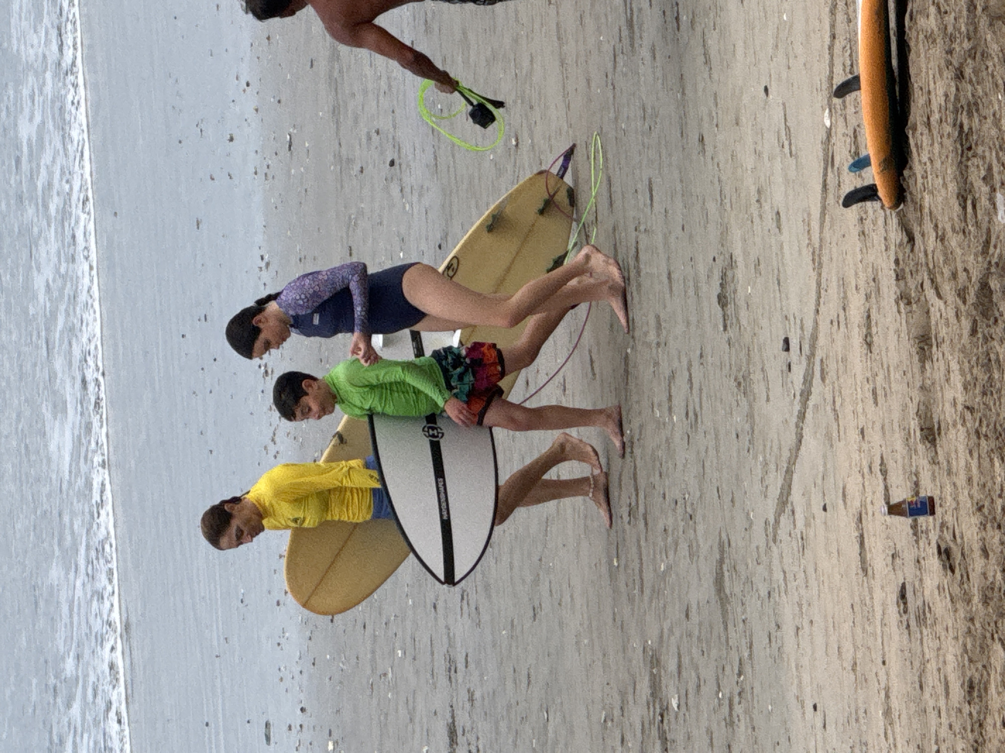 Kuta Beach surf crowd on a gray morning
