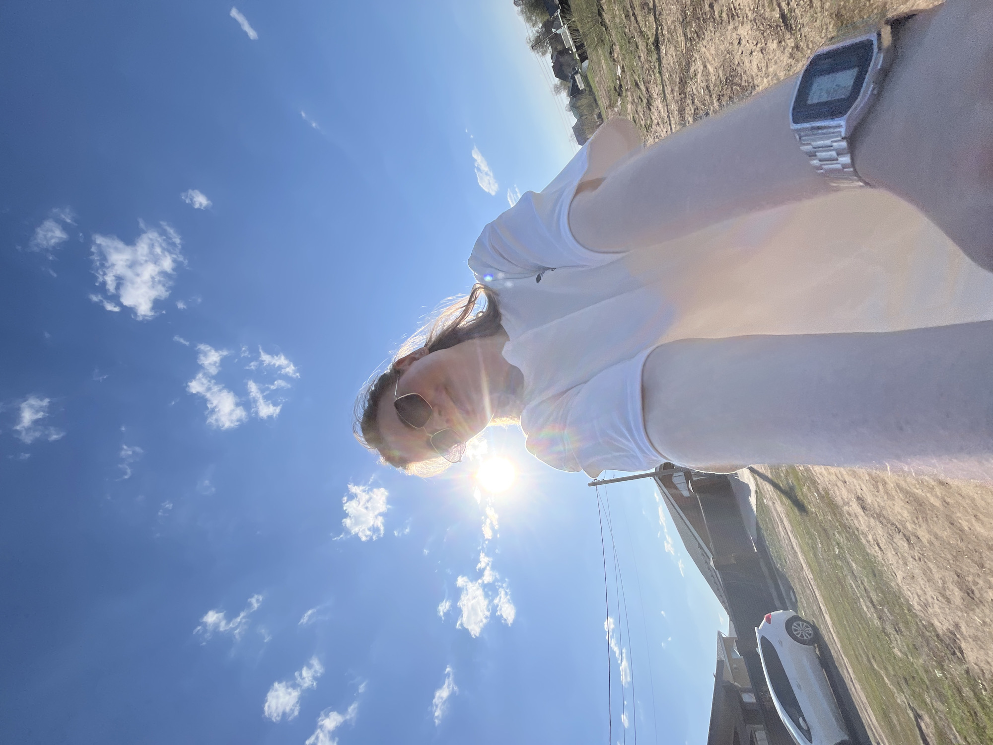 Woman photographed with infant during rural outing in Chaikovsky