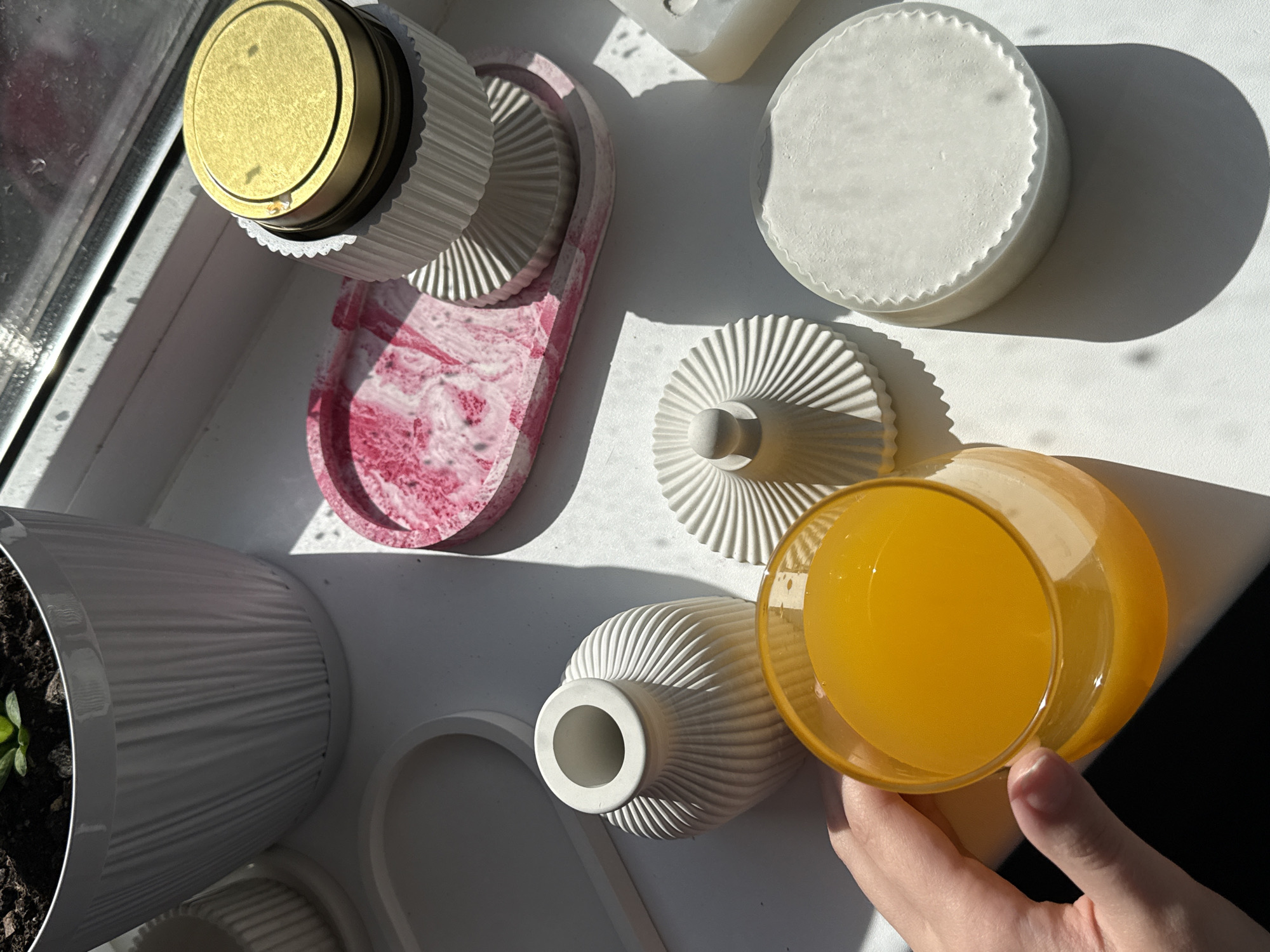 Person with orange juice documented across multiple indoor locations