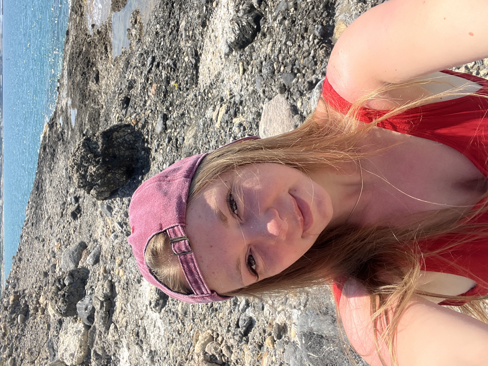 Rocky beach day near Alanya Castle on a clear June morning
