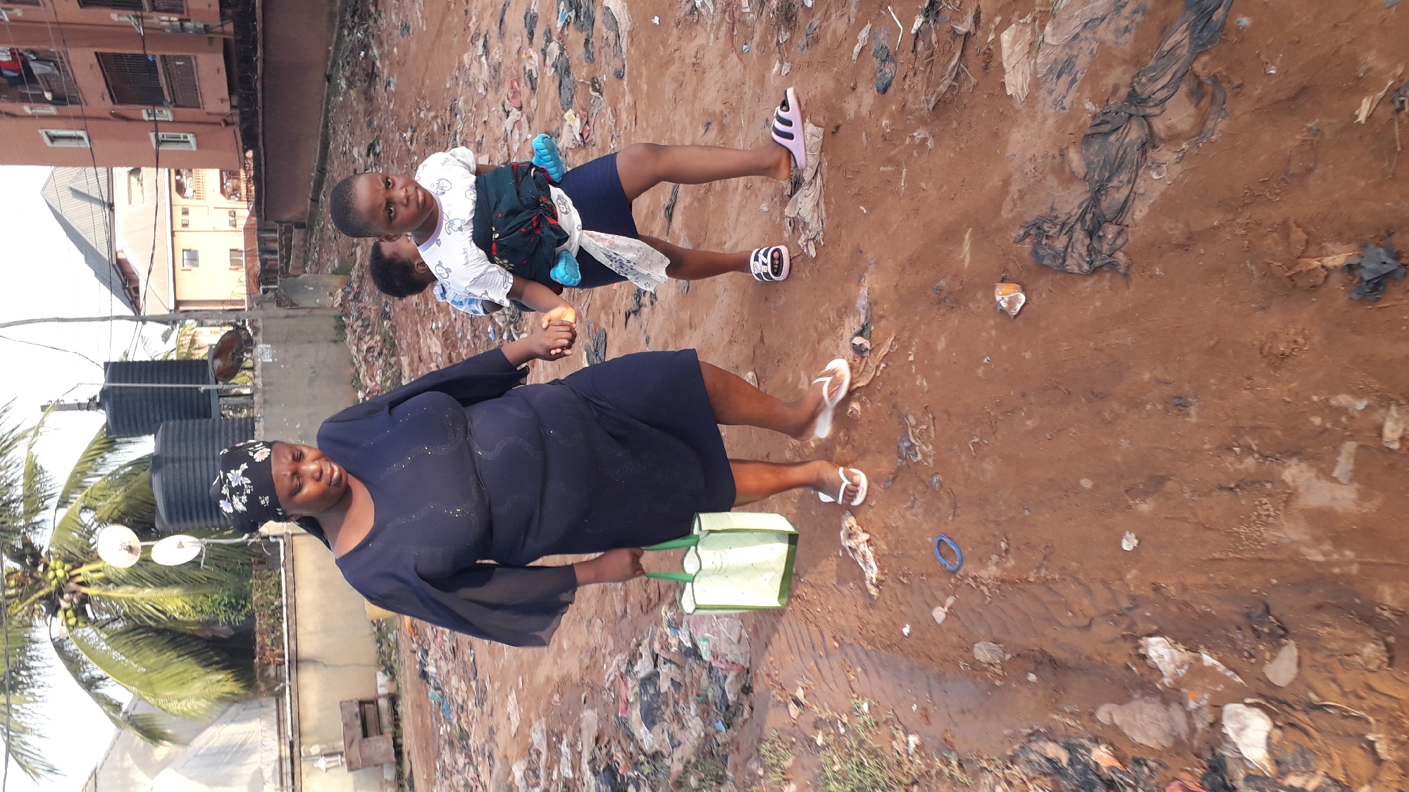 Daily life documented in trash-laden Nkpor, Nigeria streets