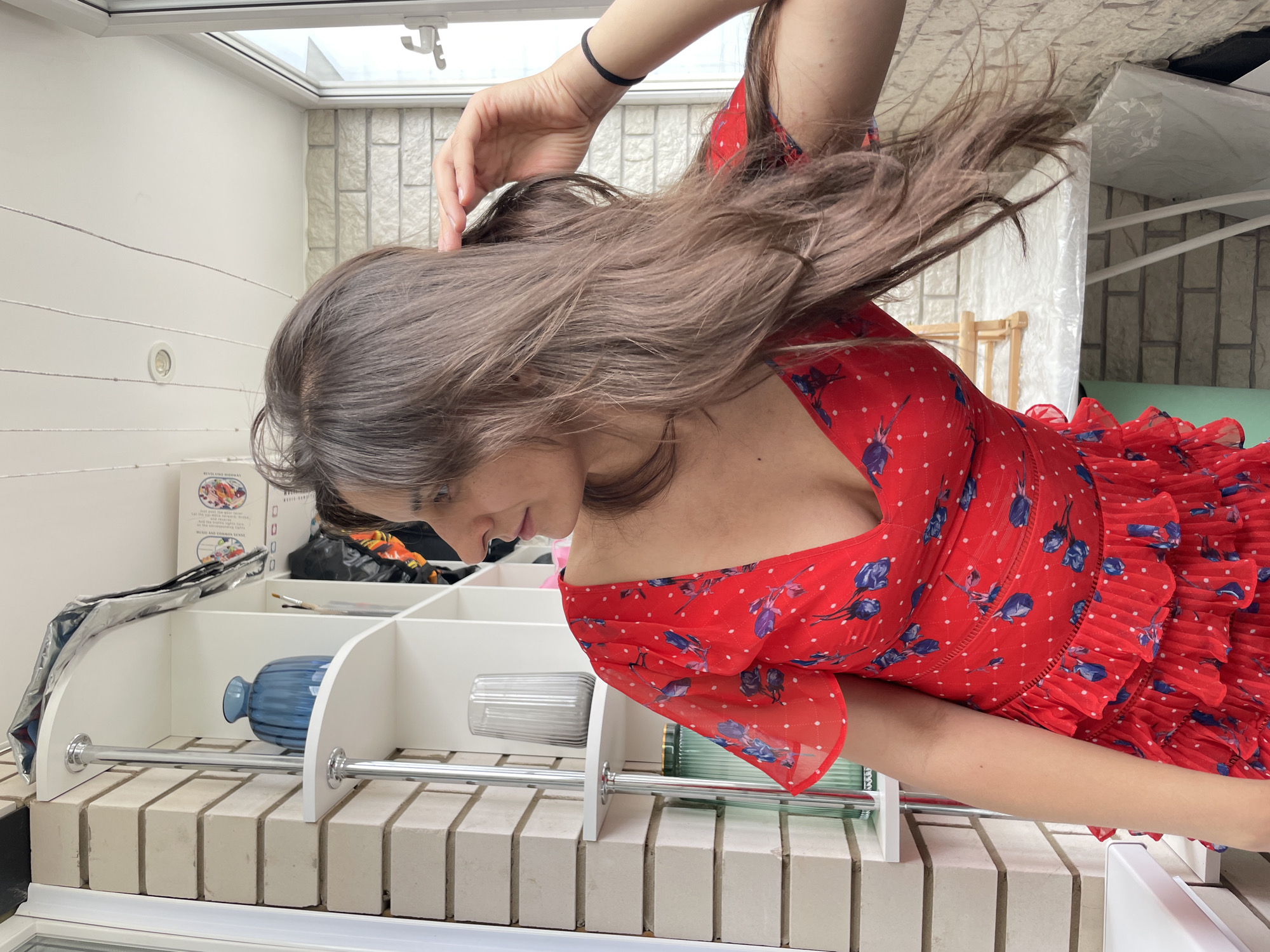 Red floral dress shoot across an Izhevsk apartment setting