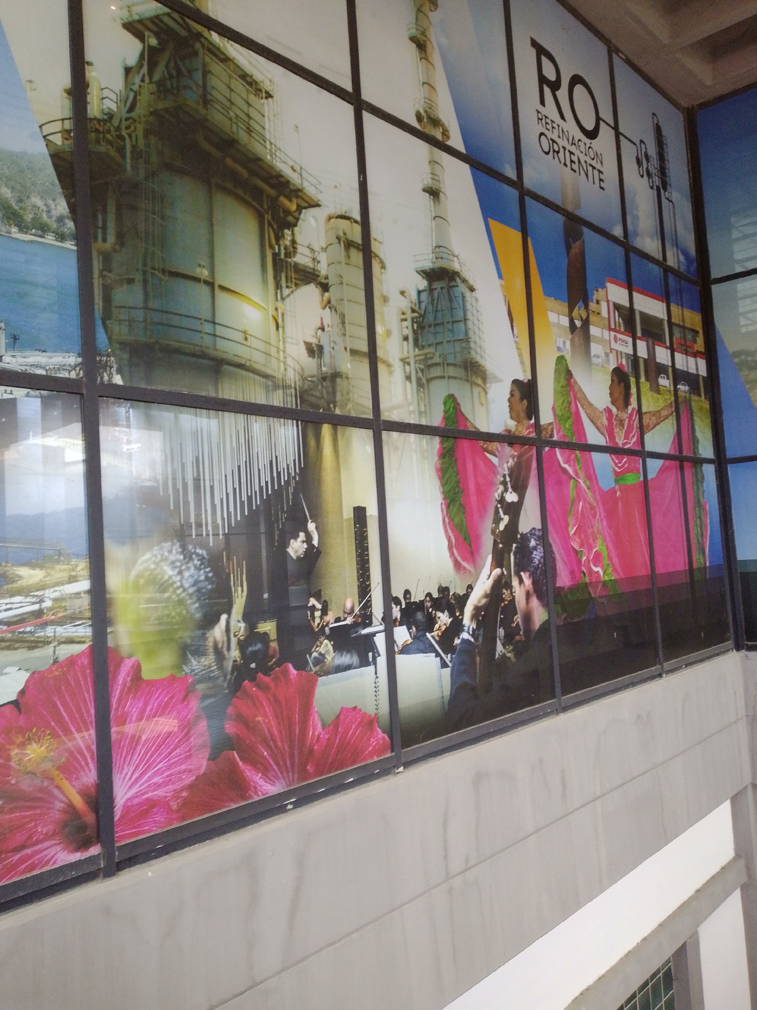Visitor documents public building interior and displays in Puerto La Cruz