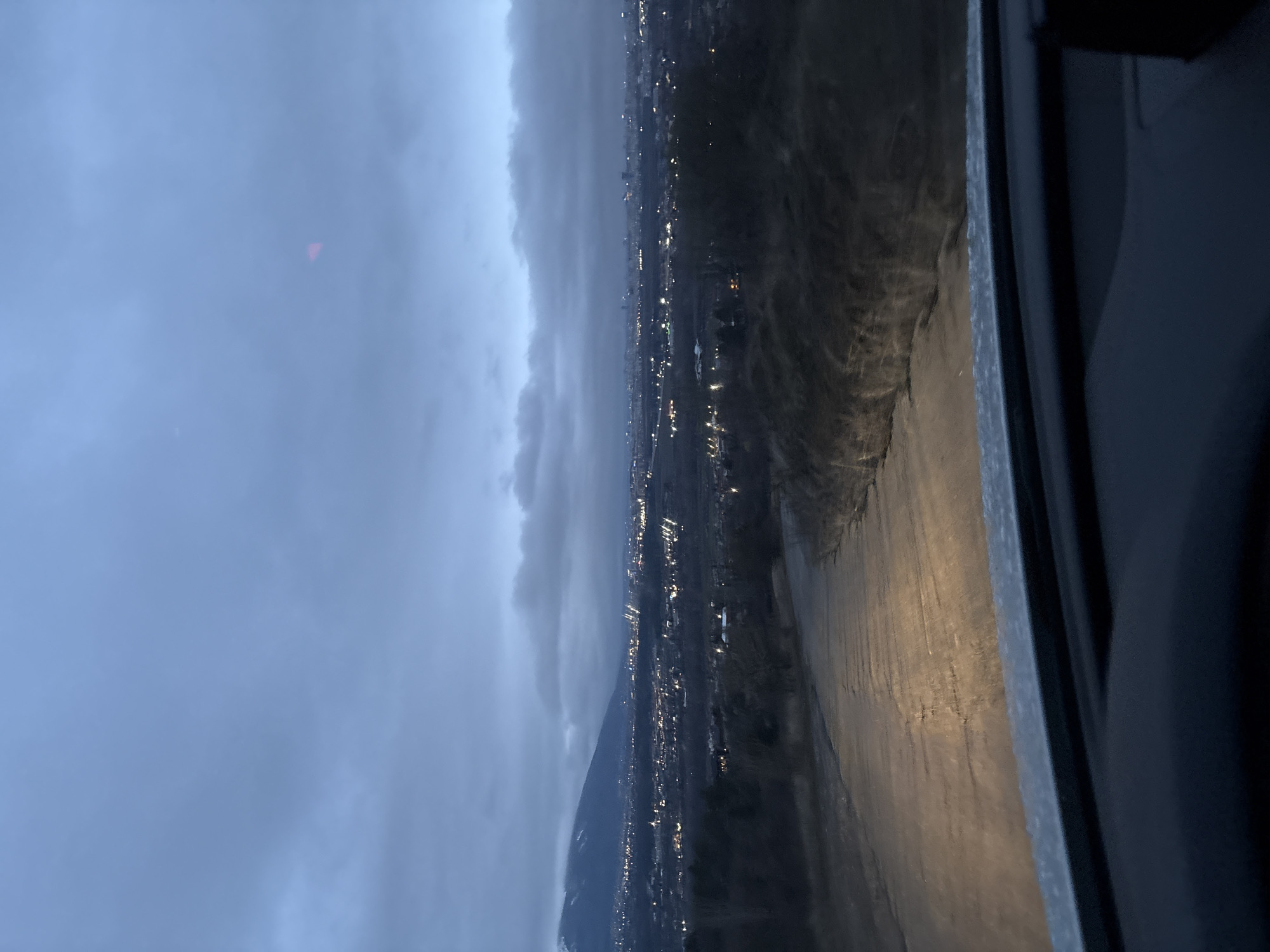 Nighttime cityscape photographed from vehicle interior in Bulgaria