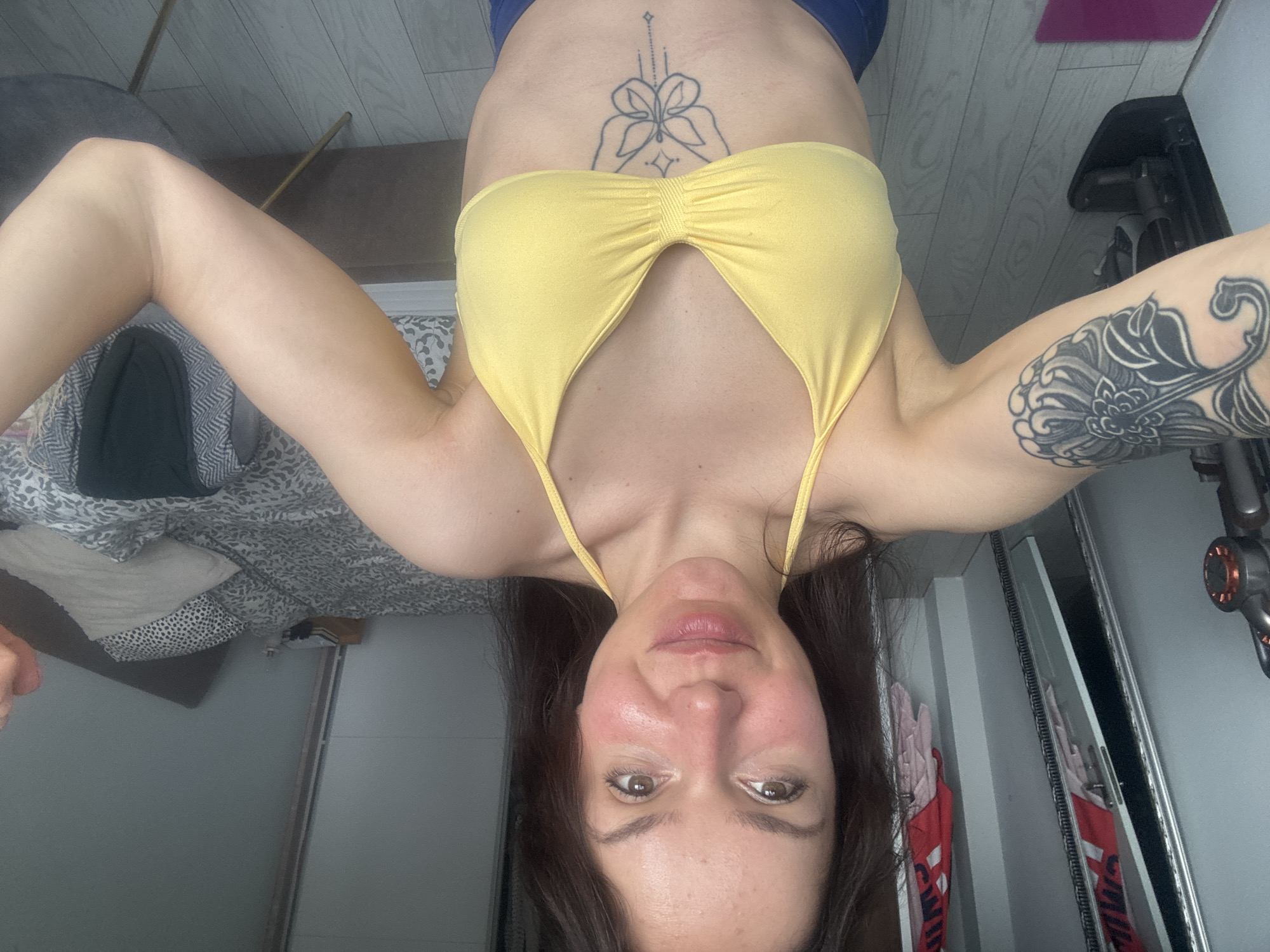 Woman takes selfies in bedroom in Burgas, Bulgaria