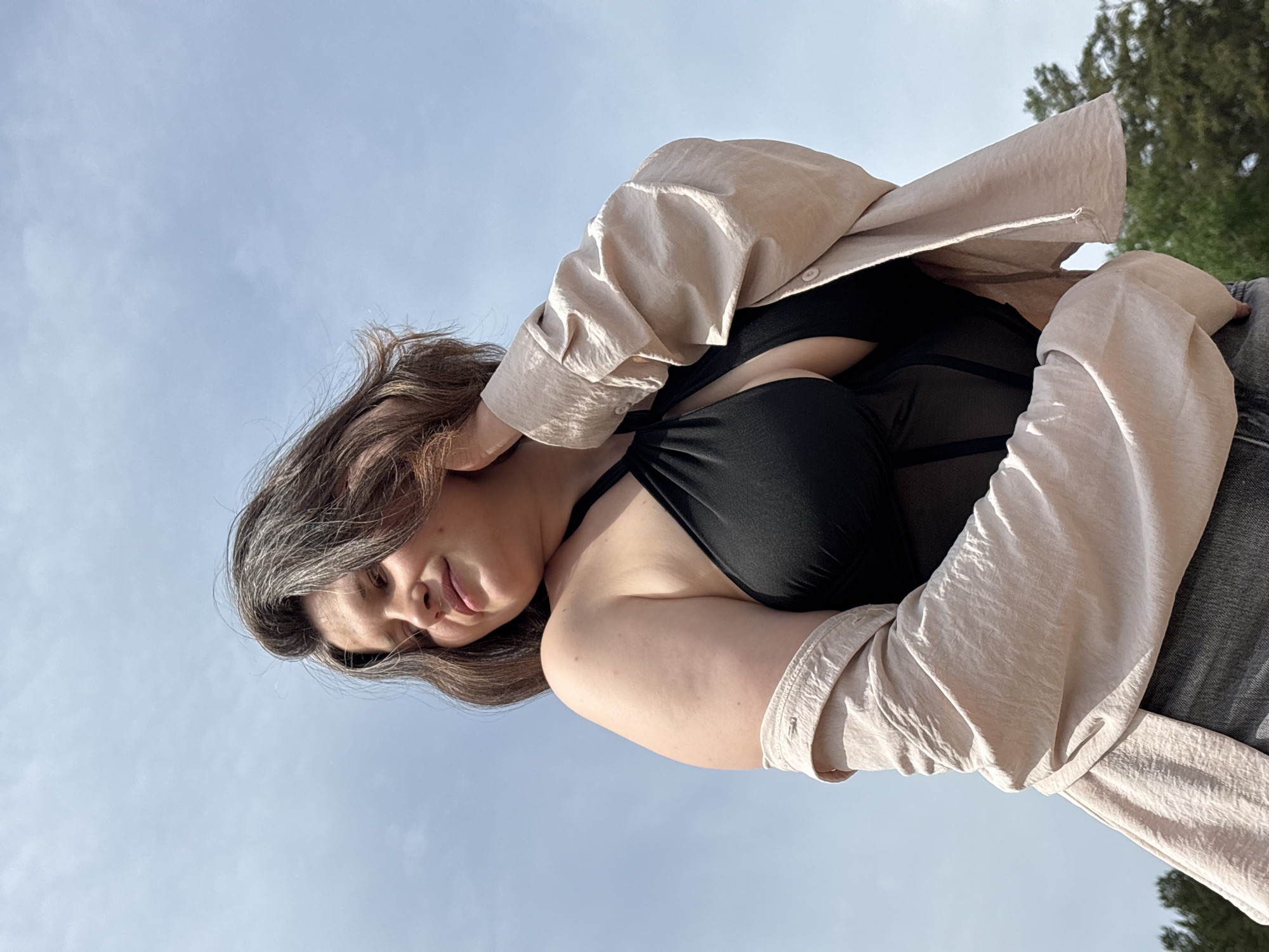 Woman photographed outdoors in Chaikovsky, Russia morning scene