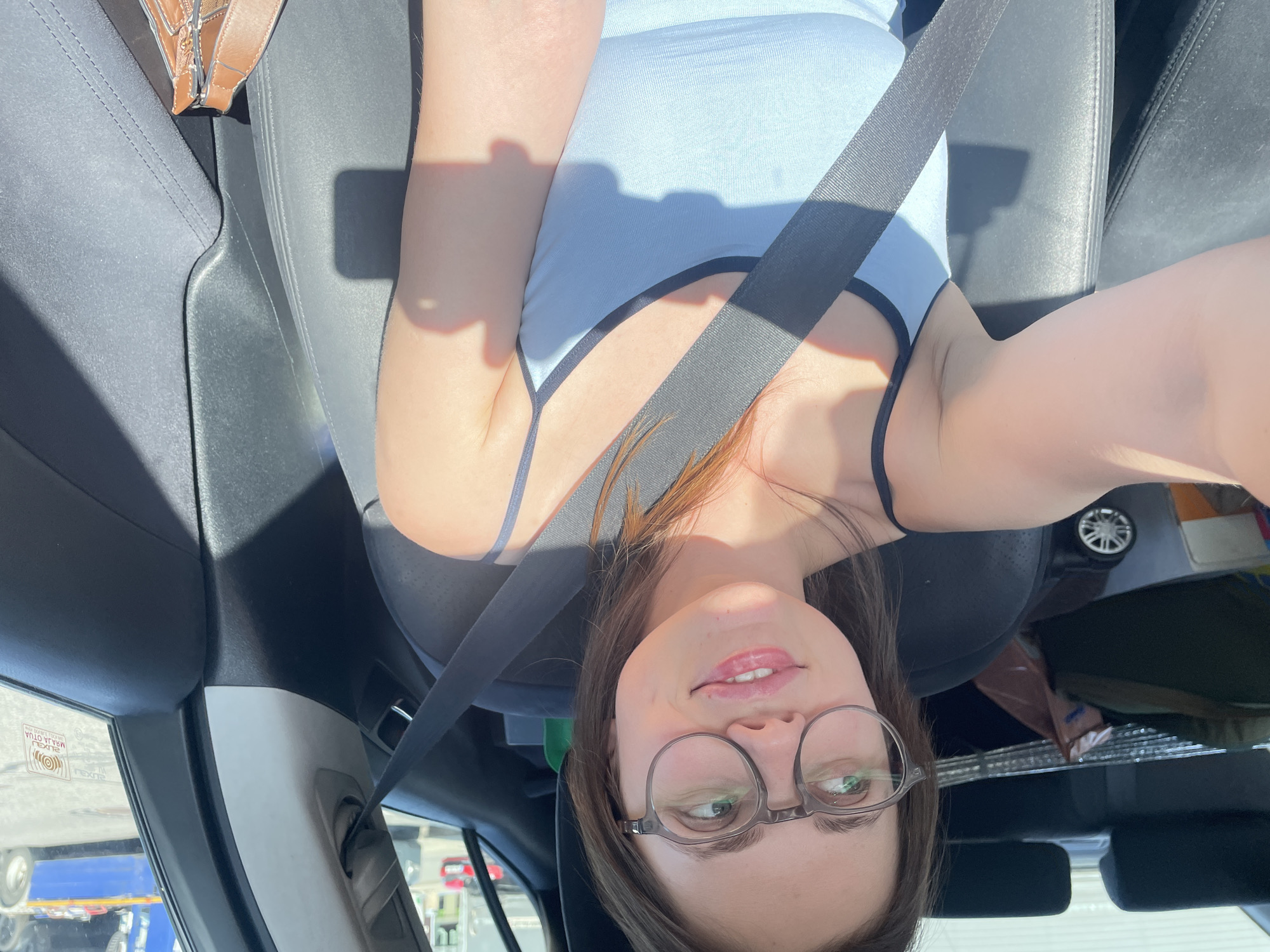 Woman photographed in car driver's seat in Jihlava