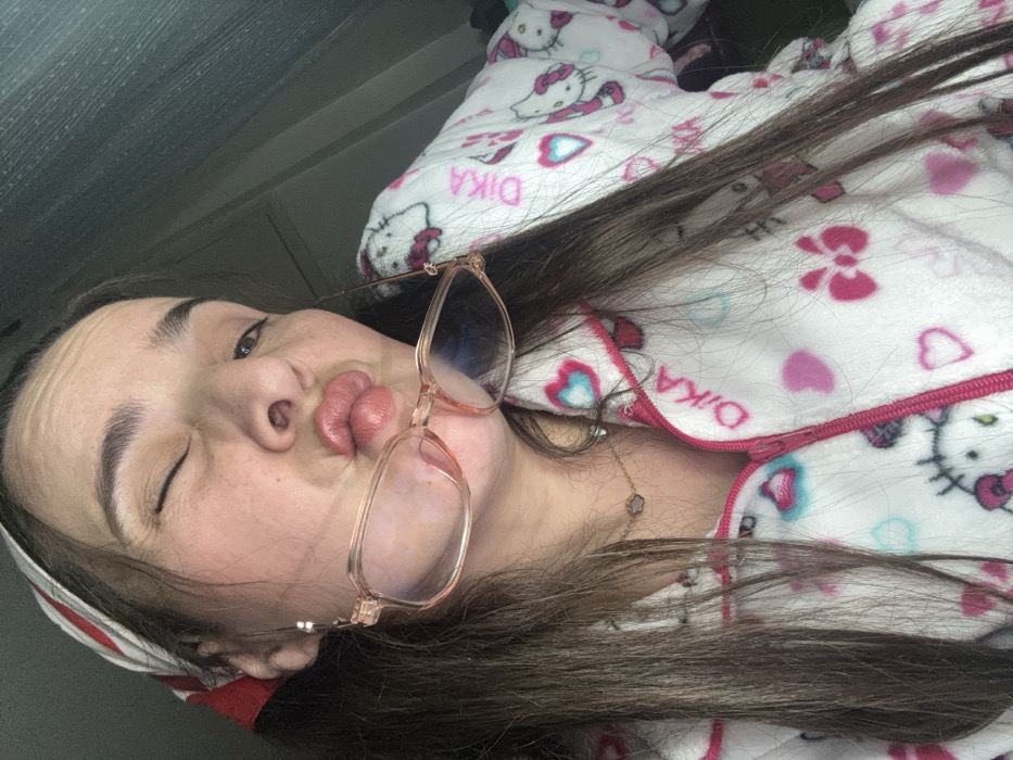 Woman Takes 30 Playful Selfies in Hello Kitty Pajamas