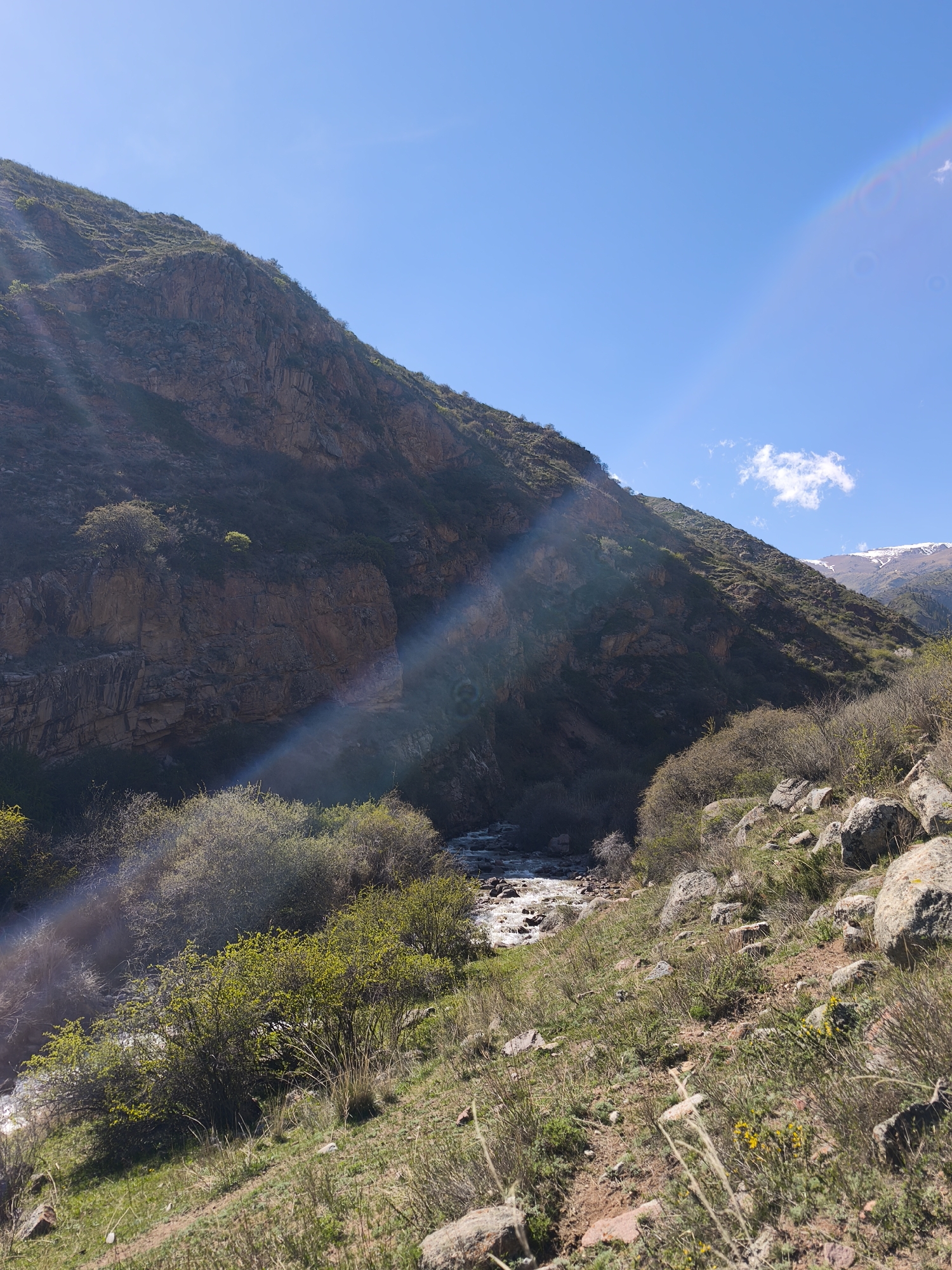 Hiker explores mountain trails near Cholpon Ata, Kyrgyzstan