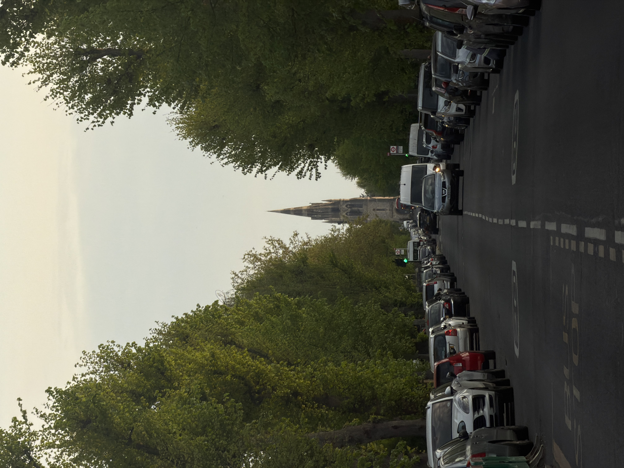 Evening street scenes documented in London amid sunset clouds