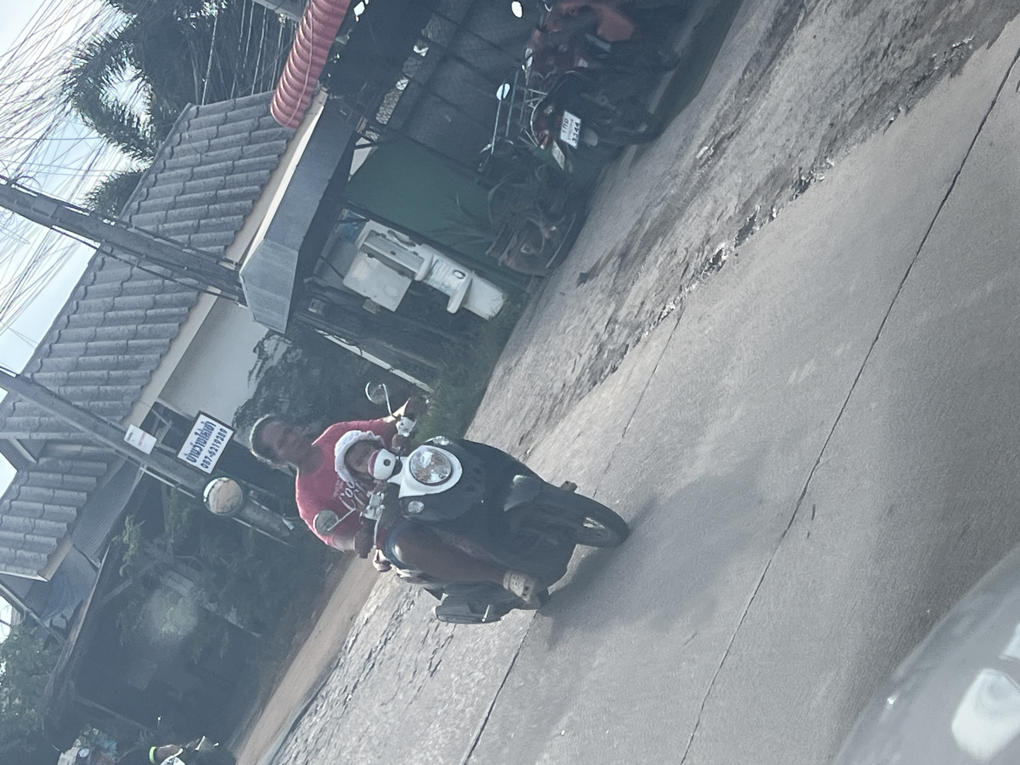 Ordinary morning street life captured in Thai village