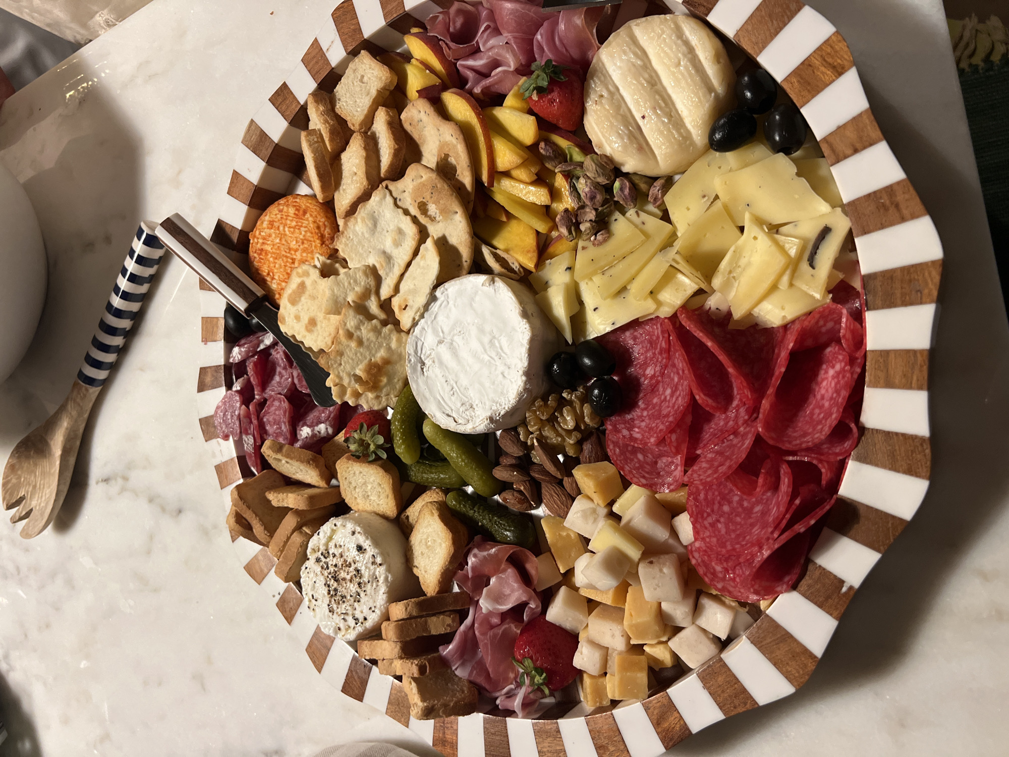 Charcuterie board spread on marble in northern Portugal