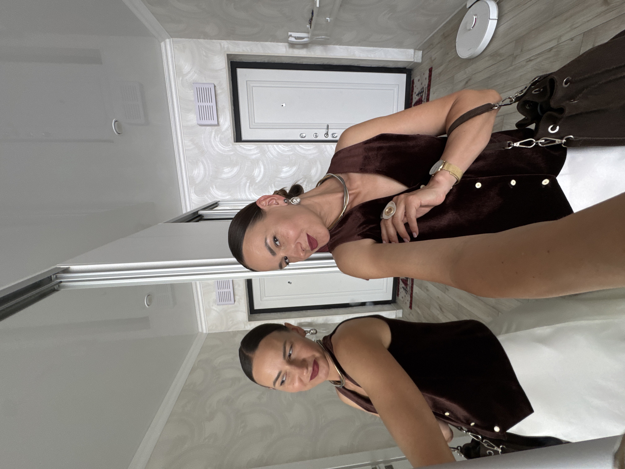 Mirror selfie session at a Sochi apartment, outfit ready to go