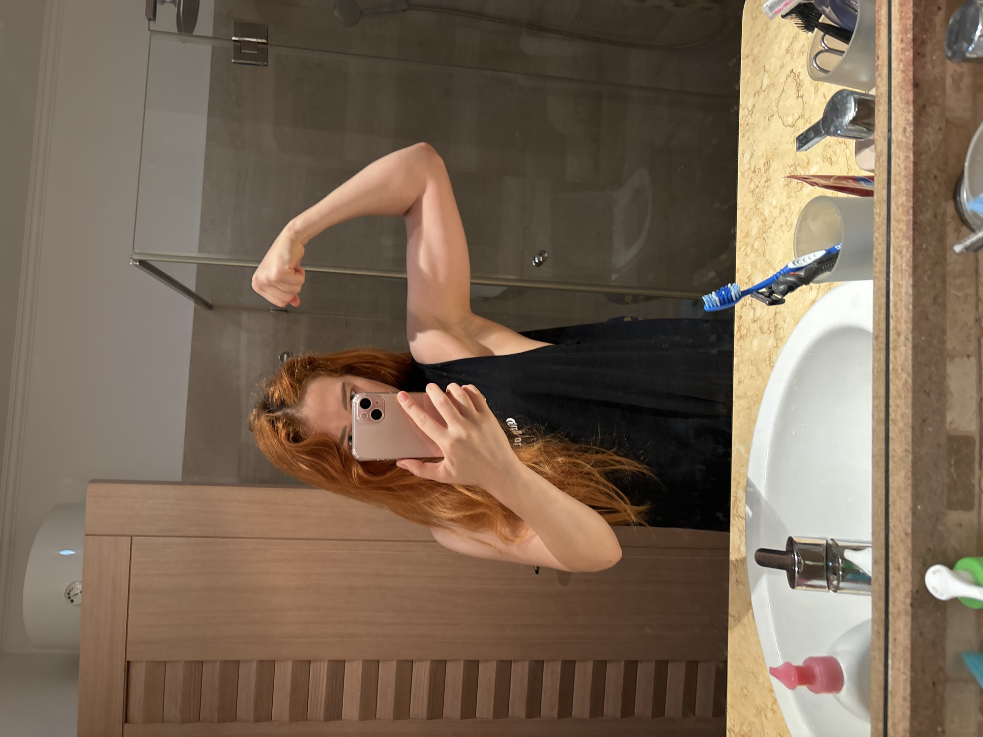 Woman documents morning routine with selfies in Budva, Montenegro