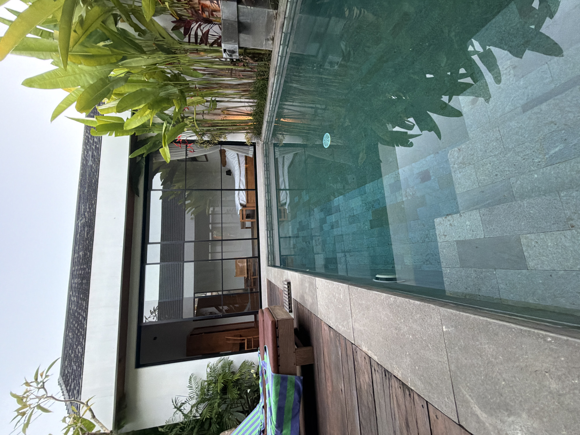 Peaceful villa pool scene captured in Ubud, Indonesia