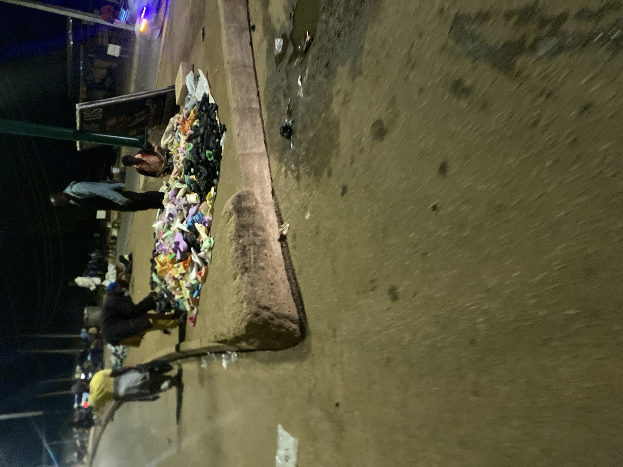 Evening market life continues in Bukuru, Nigeria streets