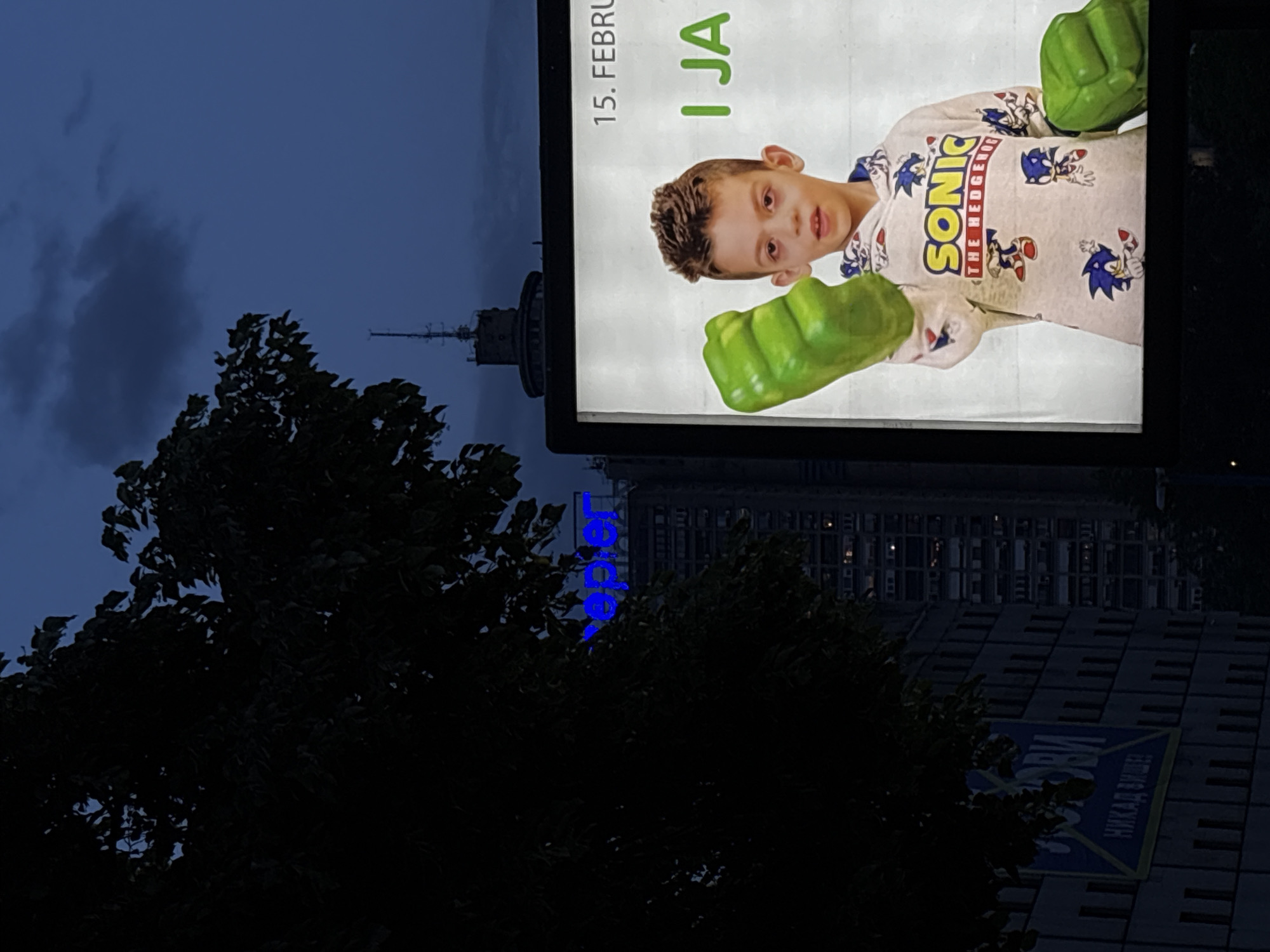 Billboard Shows Boy in Sonic Shirt, Hulk Hands in Belgrade
