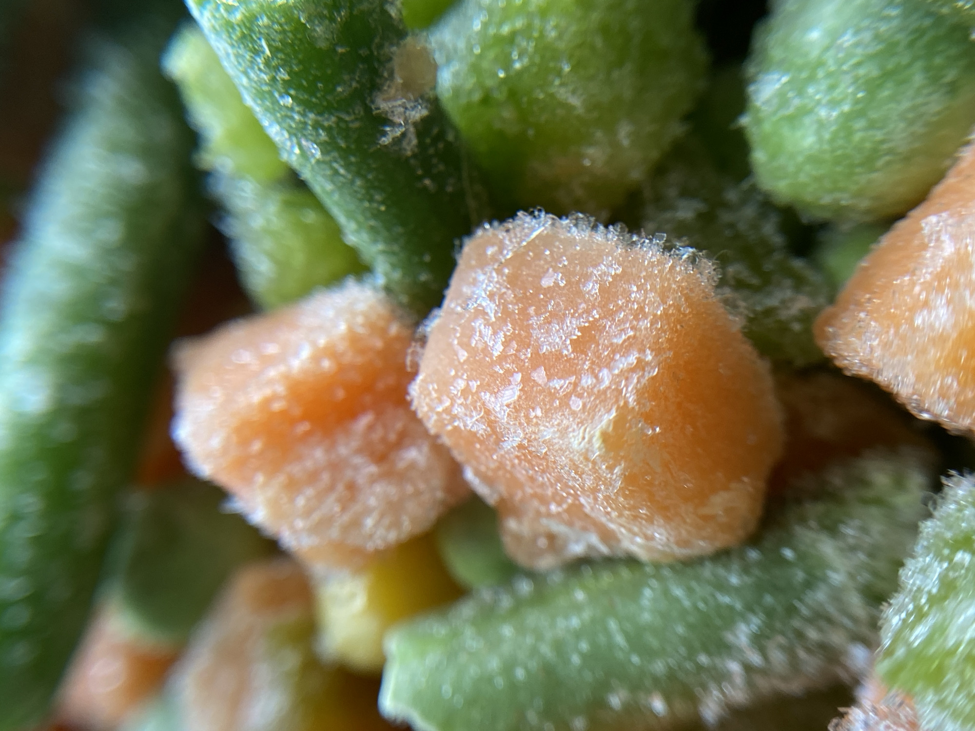 Frozen vegetables, frosted cookies, and a city street afternoon