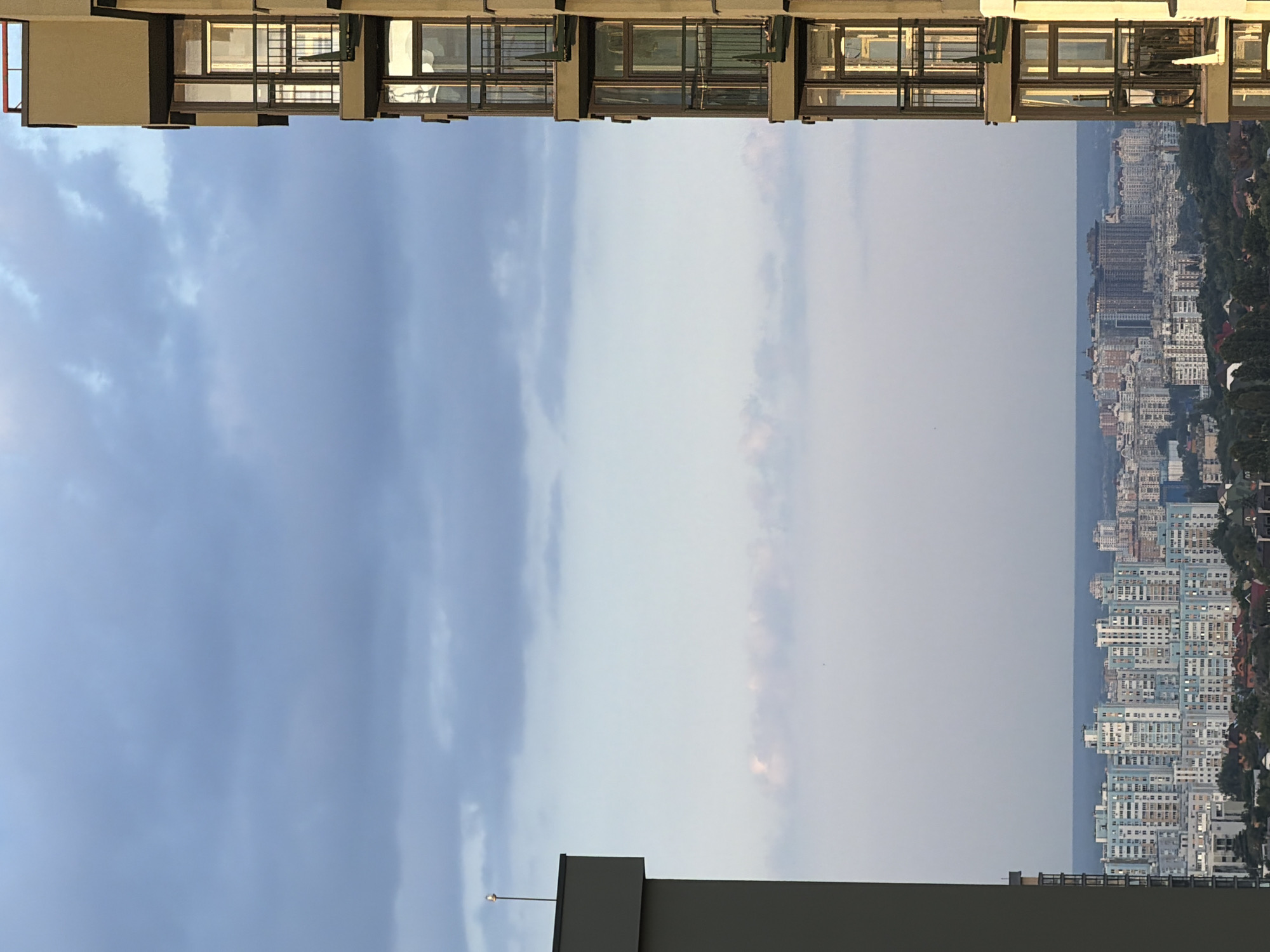 Kyiv residential district at sunset, rooftop to street level