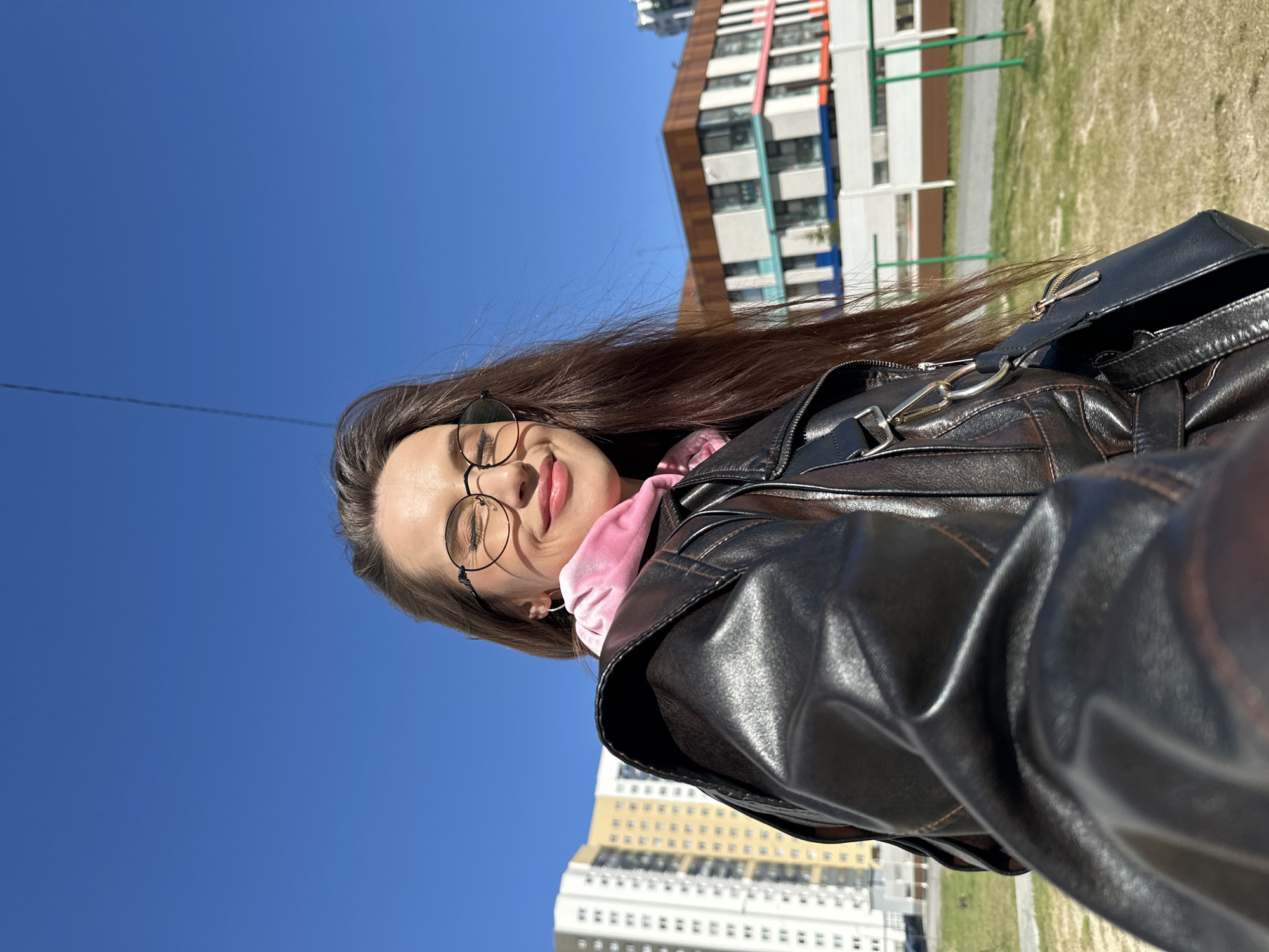 Woman documents playground visit with toddler in Yekaterinburg