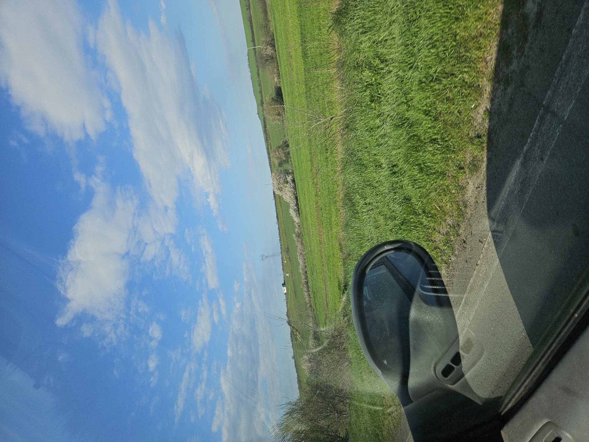 Morning drive through Bulgarian countryside captured from vehicle interior