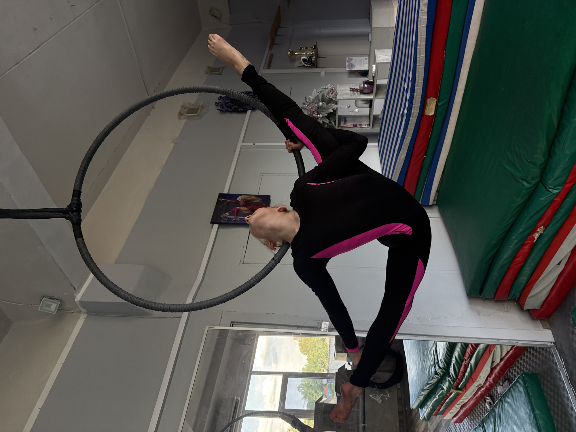 Young athlete performs aerial hoop routine in Dnipro