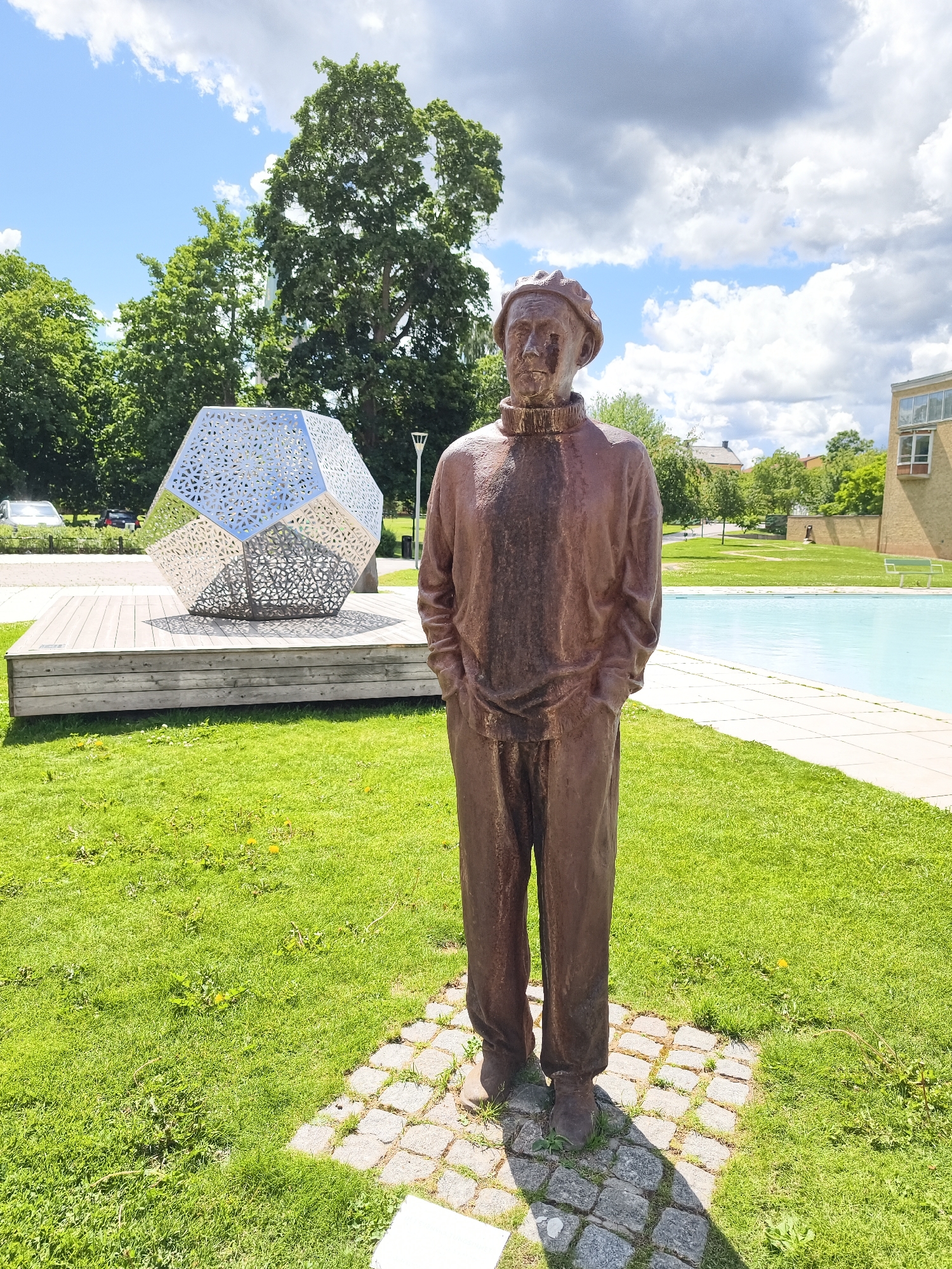 Summer morning tour of Linköping's parks, pools, and public monuments