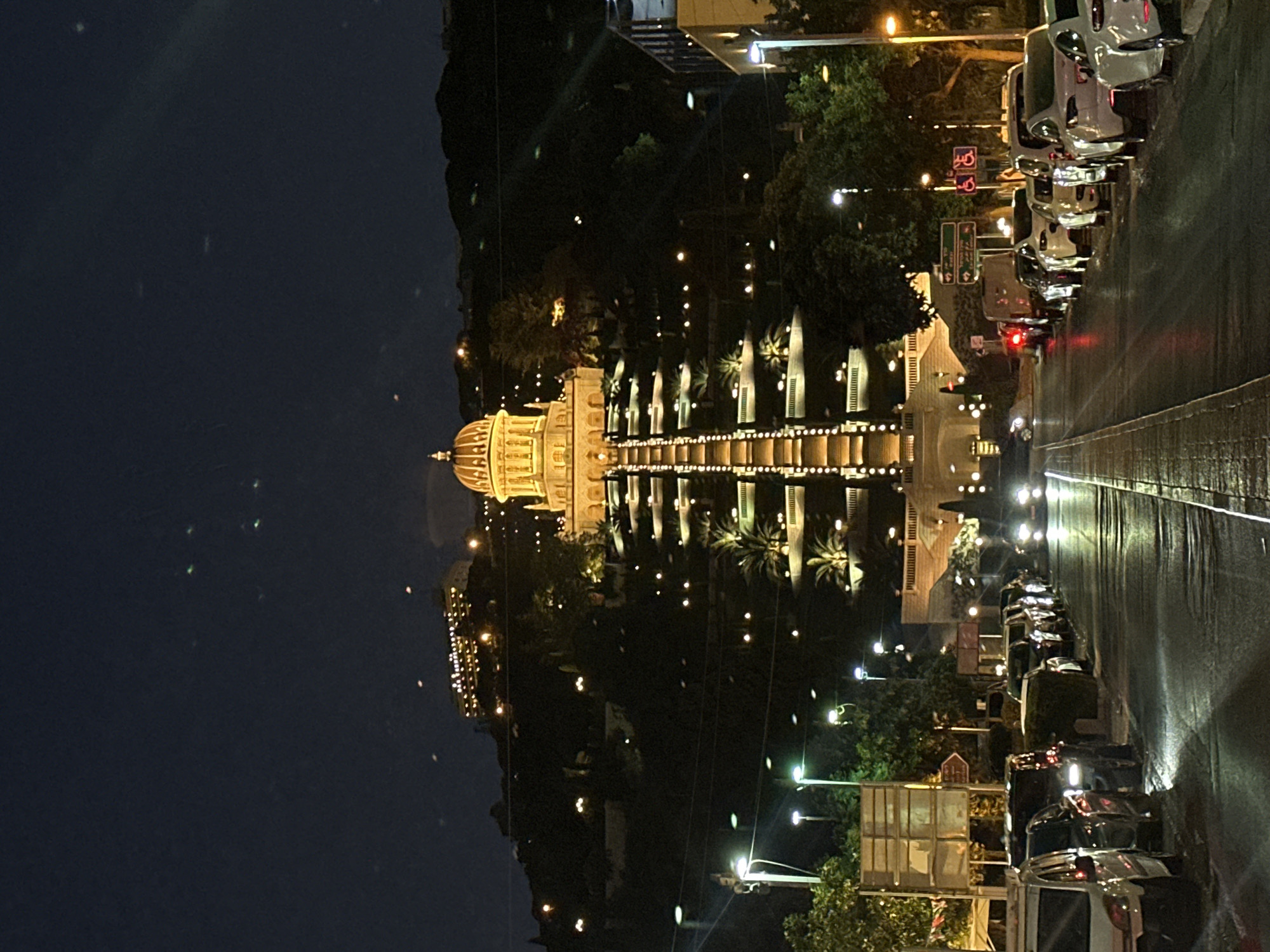 Haifa at night: the Bahá'í Shrine and city lights