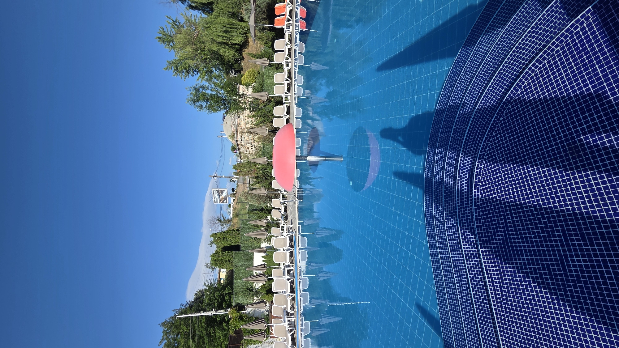 Aqua Theme Park pool area on a sunny morning in Bania
