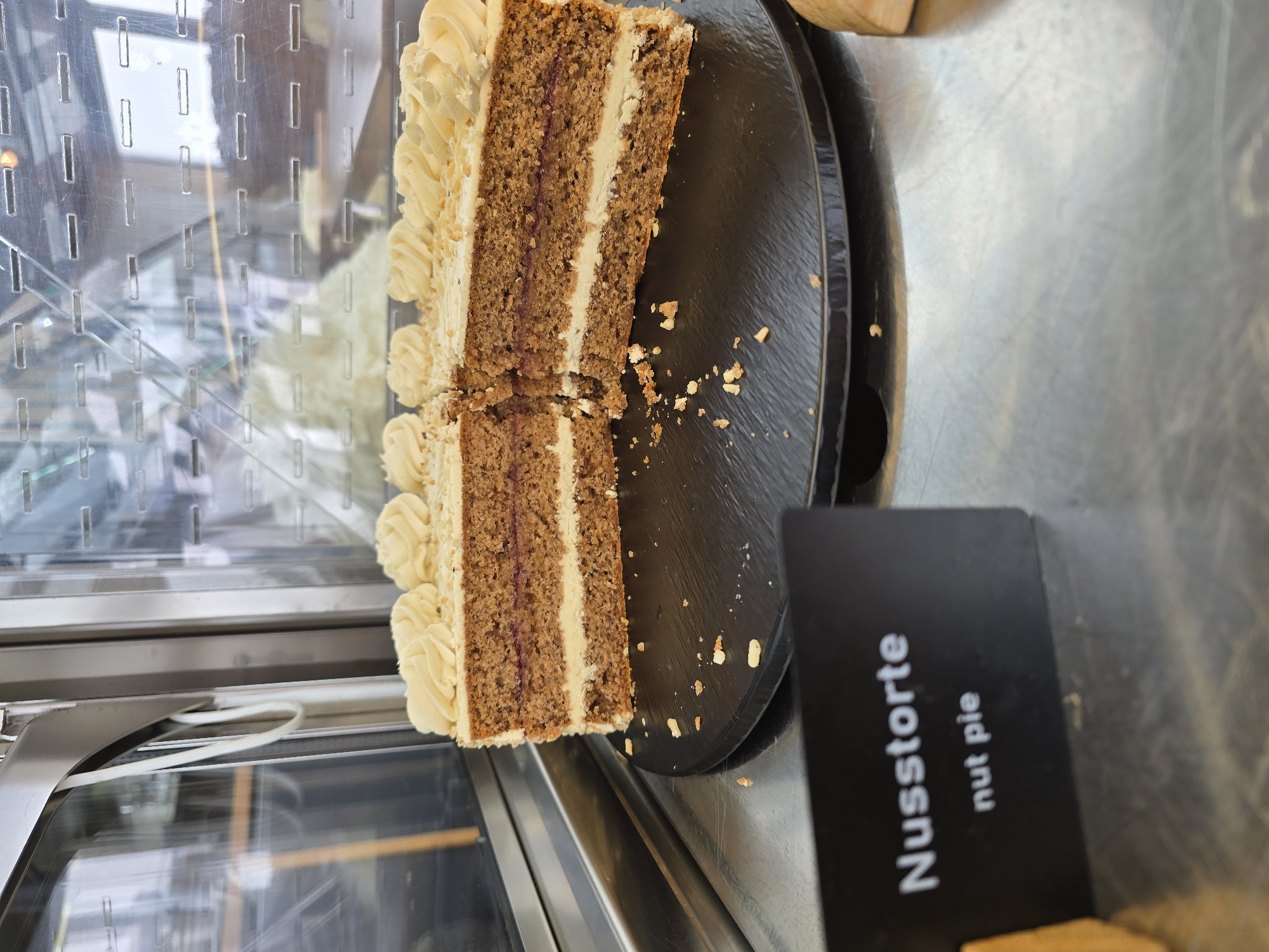 Cake slice photographed in bakery display case, Garmisch-Partenkirchen