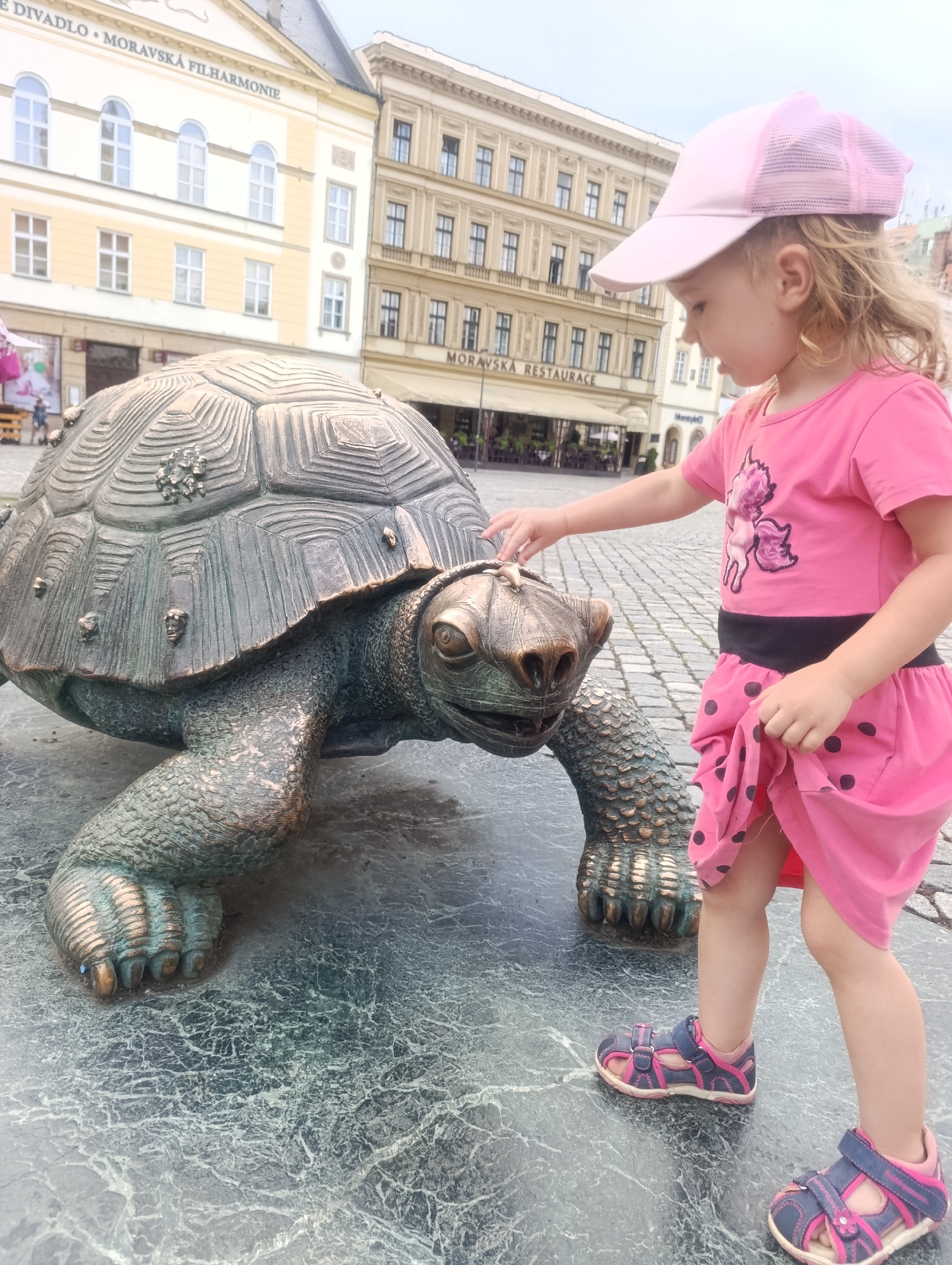 Exploring Olomouc's old town square and its bronze turtle sculpture