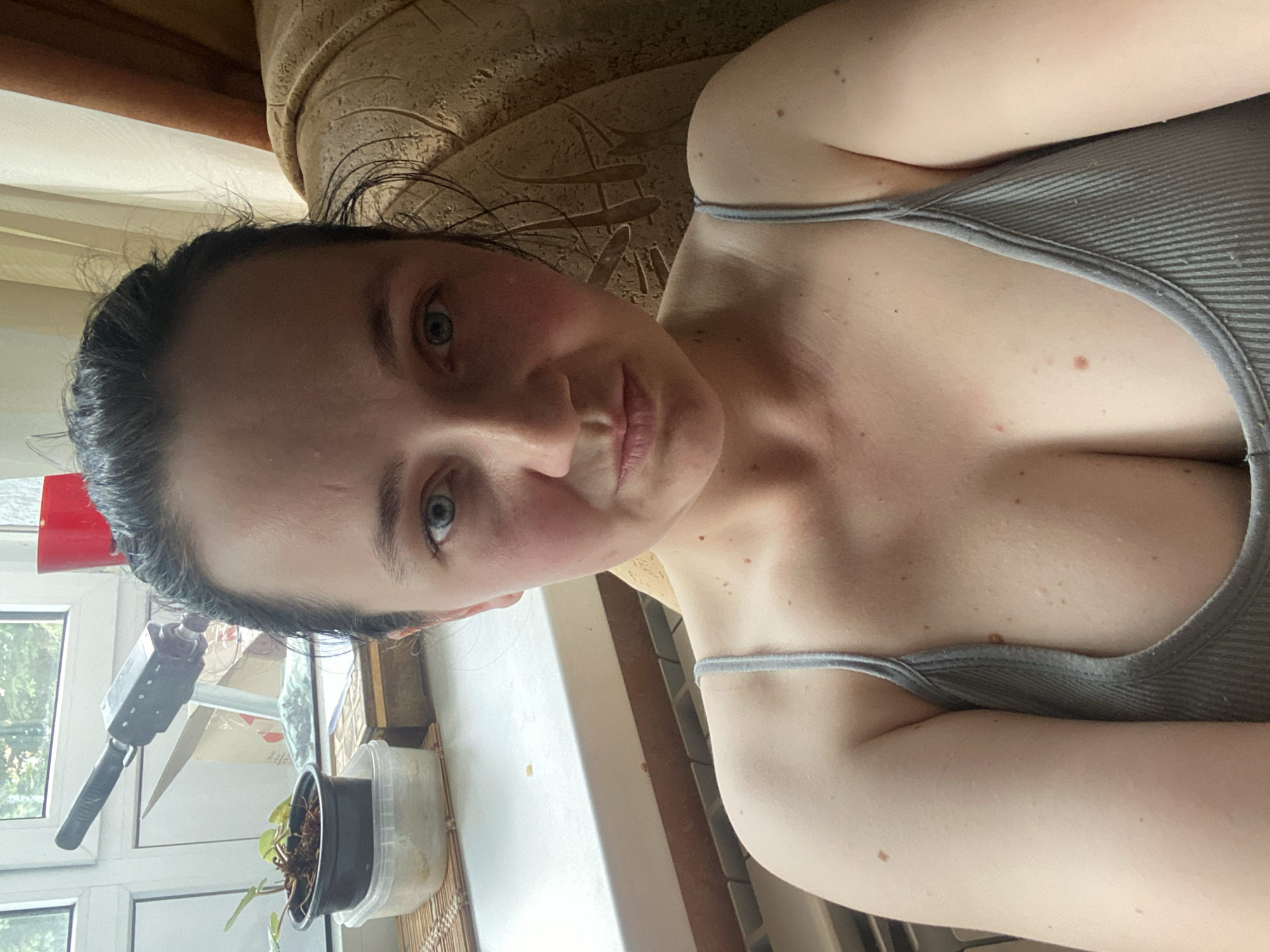 Casual home selfie session in grey athletic wear