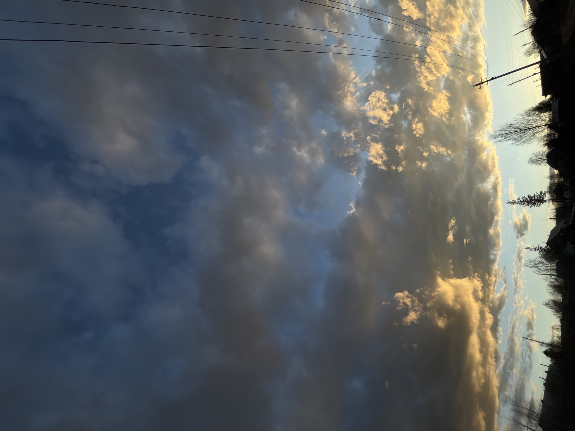 Child walks rural path during dramatic sunset in Russia