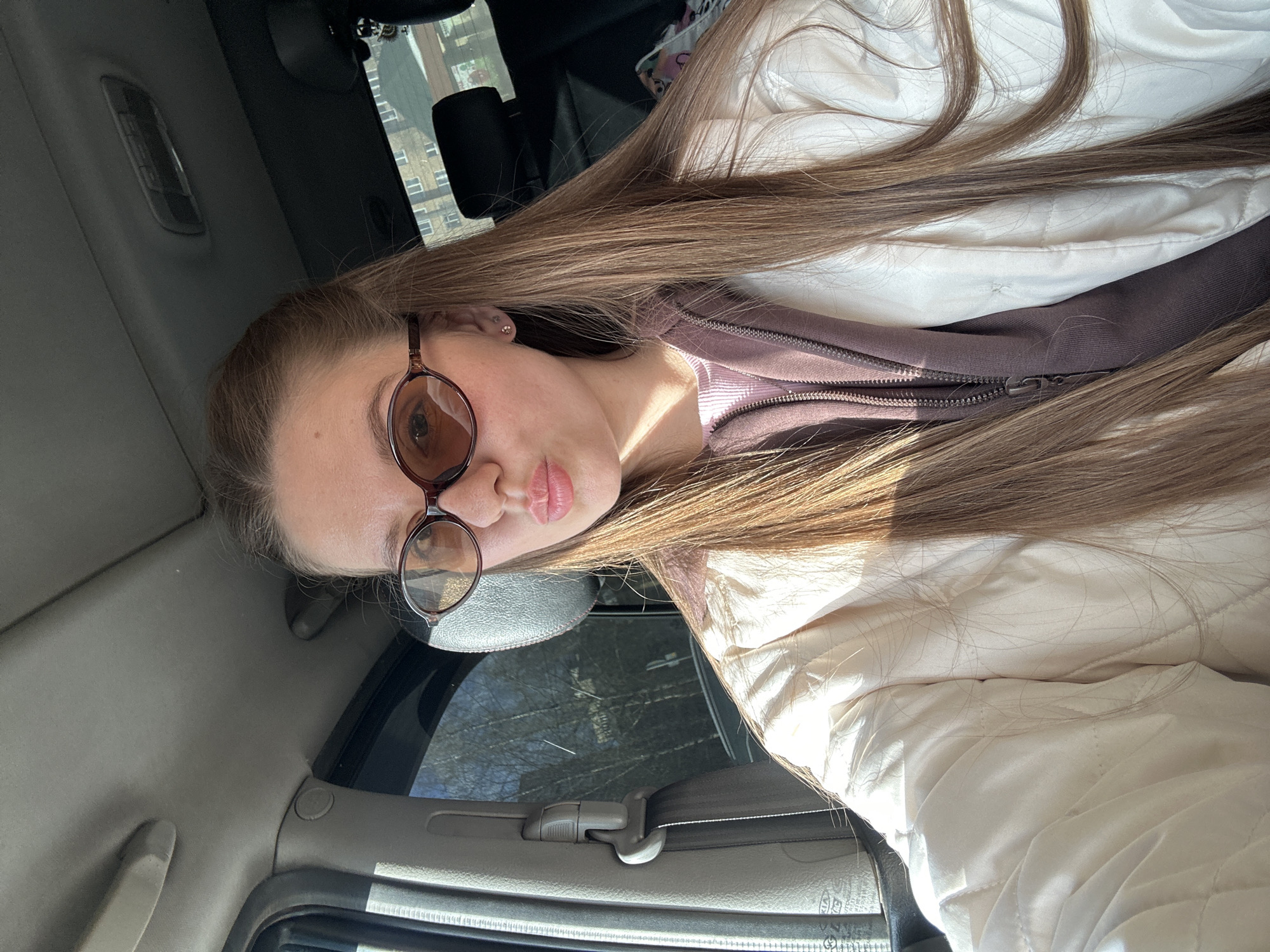 Woman observed having coffee in car in Klin, Russia
