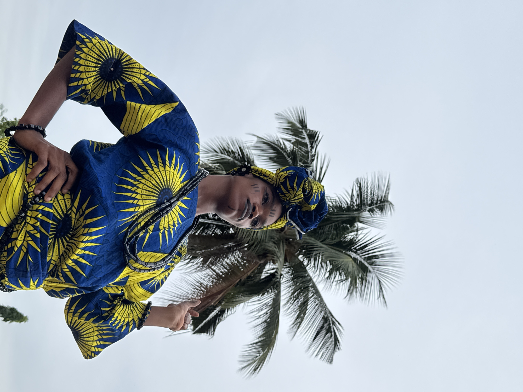 Woman in traditional Nigerian dress photographed in Badagry