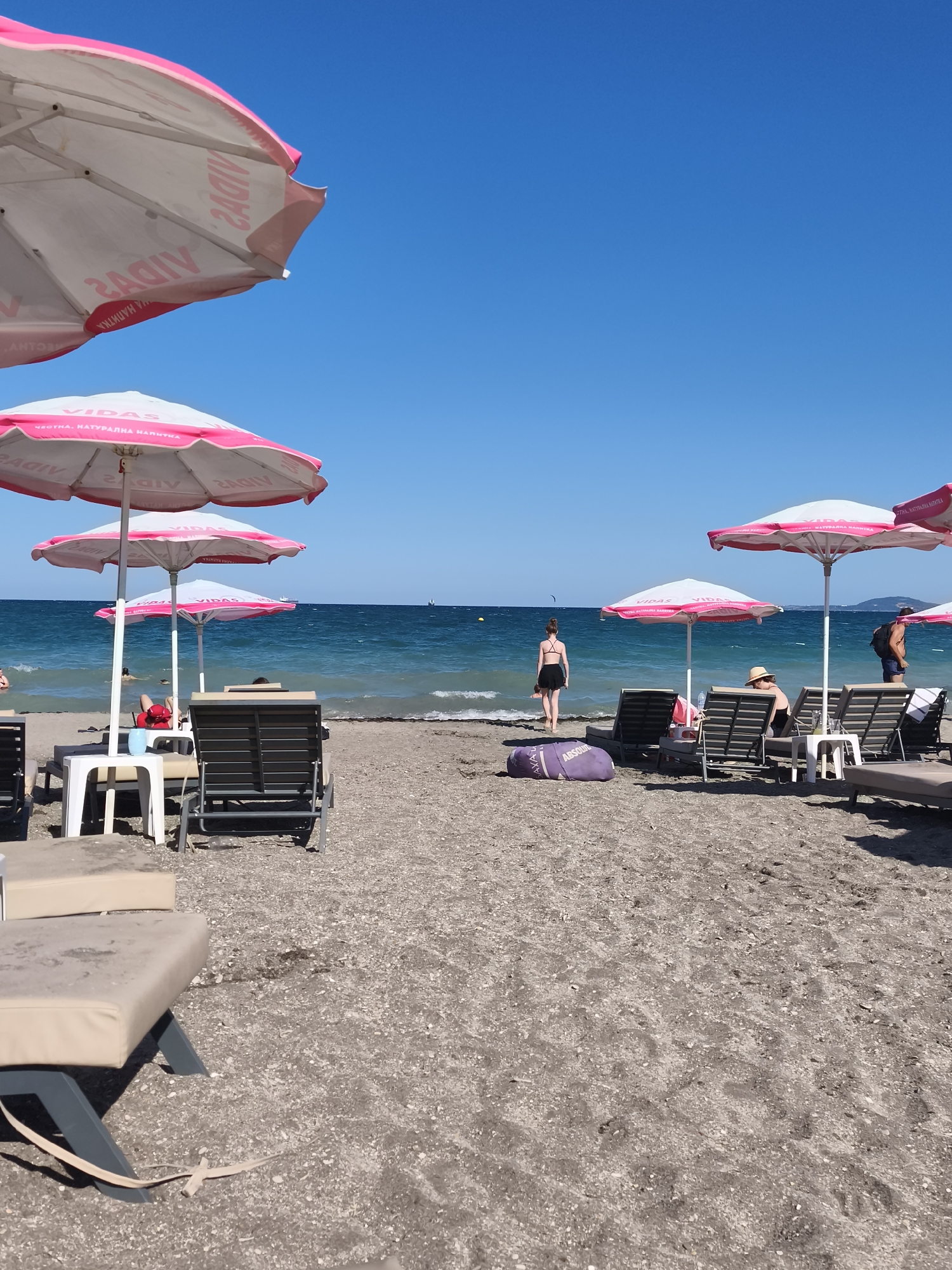 Quiet afternoon on a pebbly beach in Burgas, Bulgaria