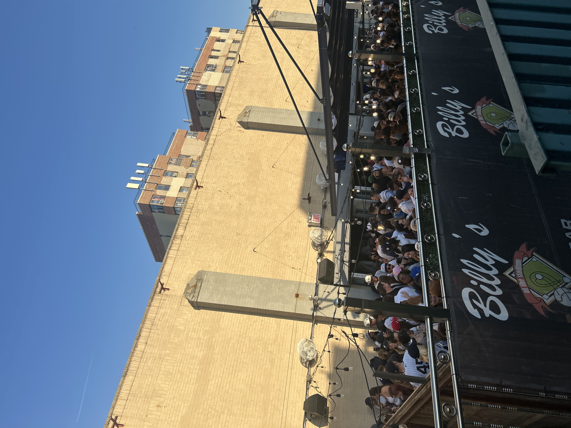 Yankees fans gather at Billy's outdoor bar in NYC