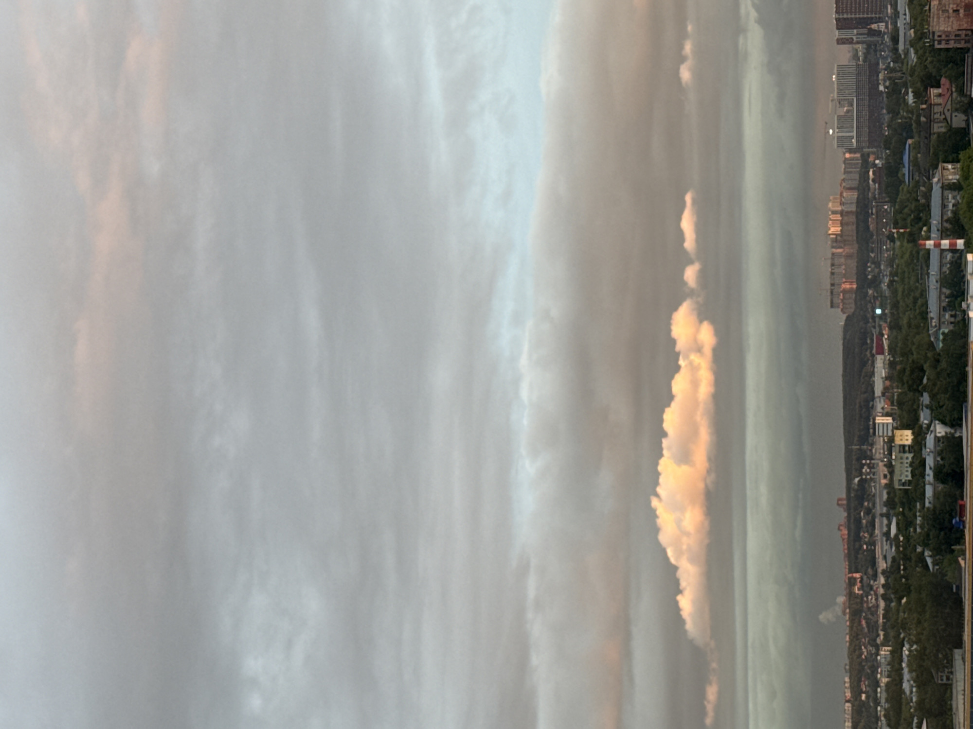 Sunset observed over Lyubertsy cityscape with cloudy skies