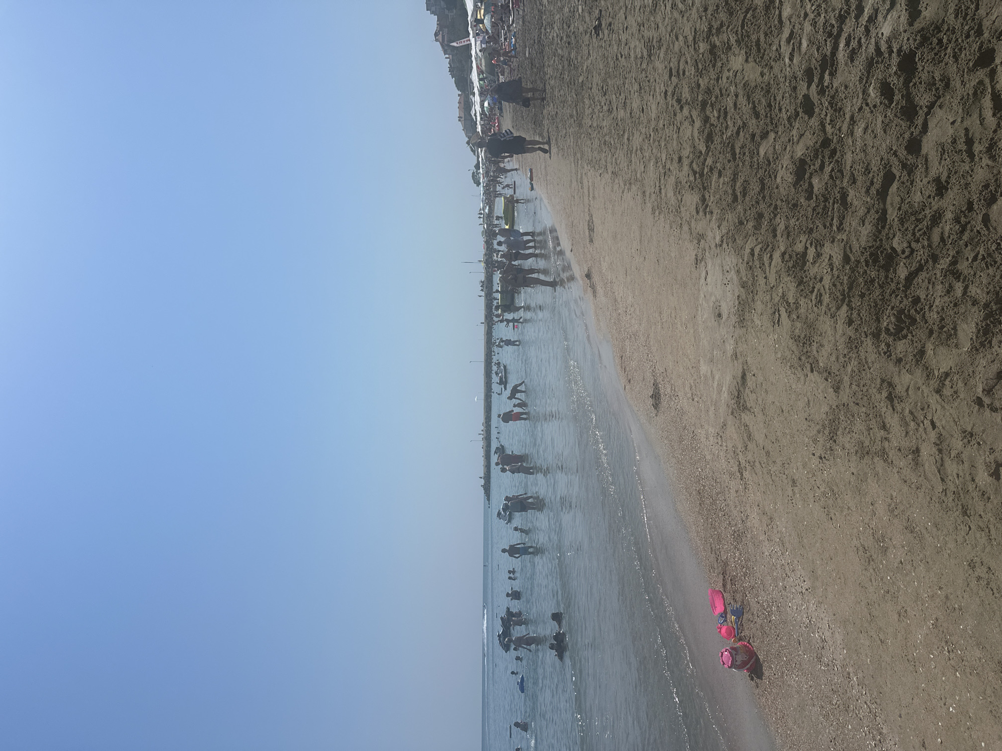 Busy summer morning on the Black Sea beach in Pomorie