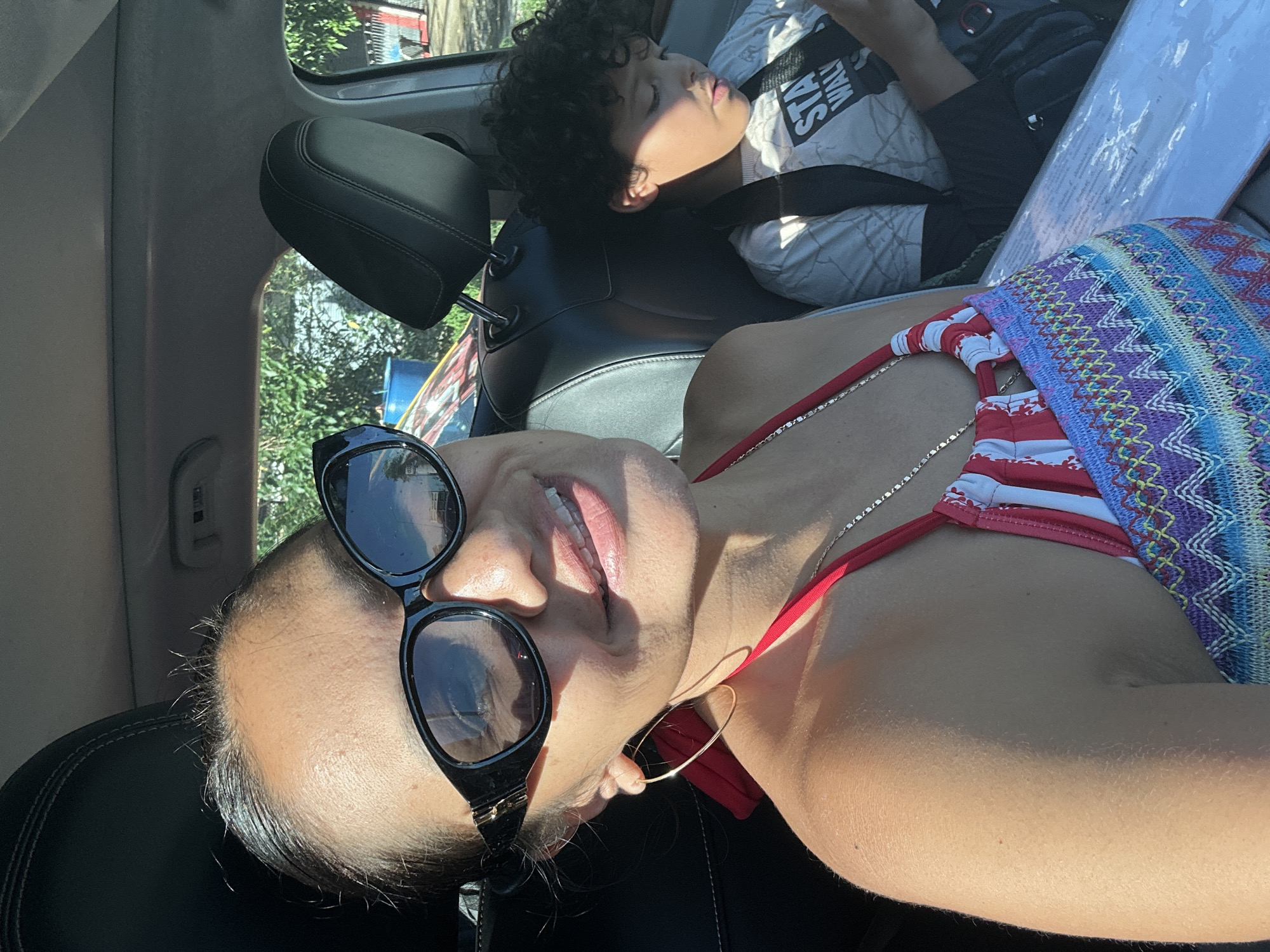 Woman in swimwear photographed in car in Ratsada, Thailand