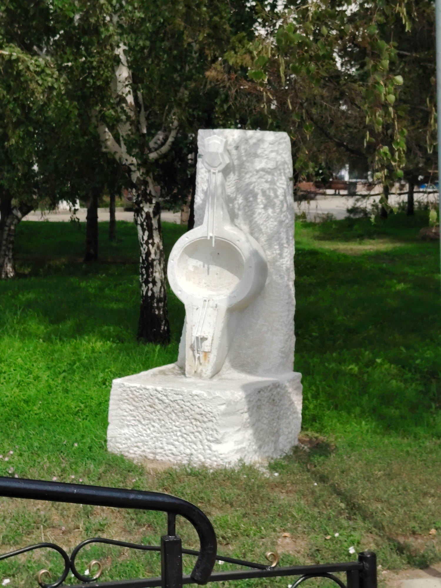 Street-level snapshot of Astana's parks, river, and city streets