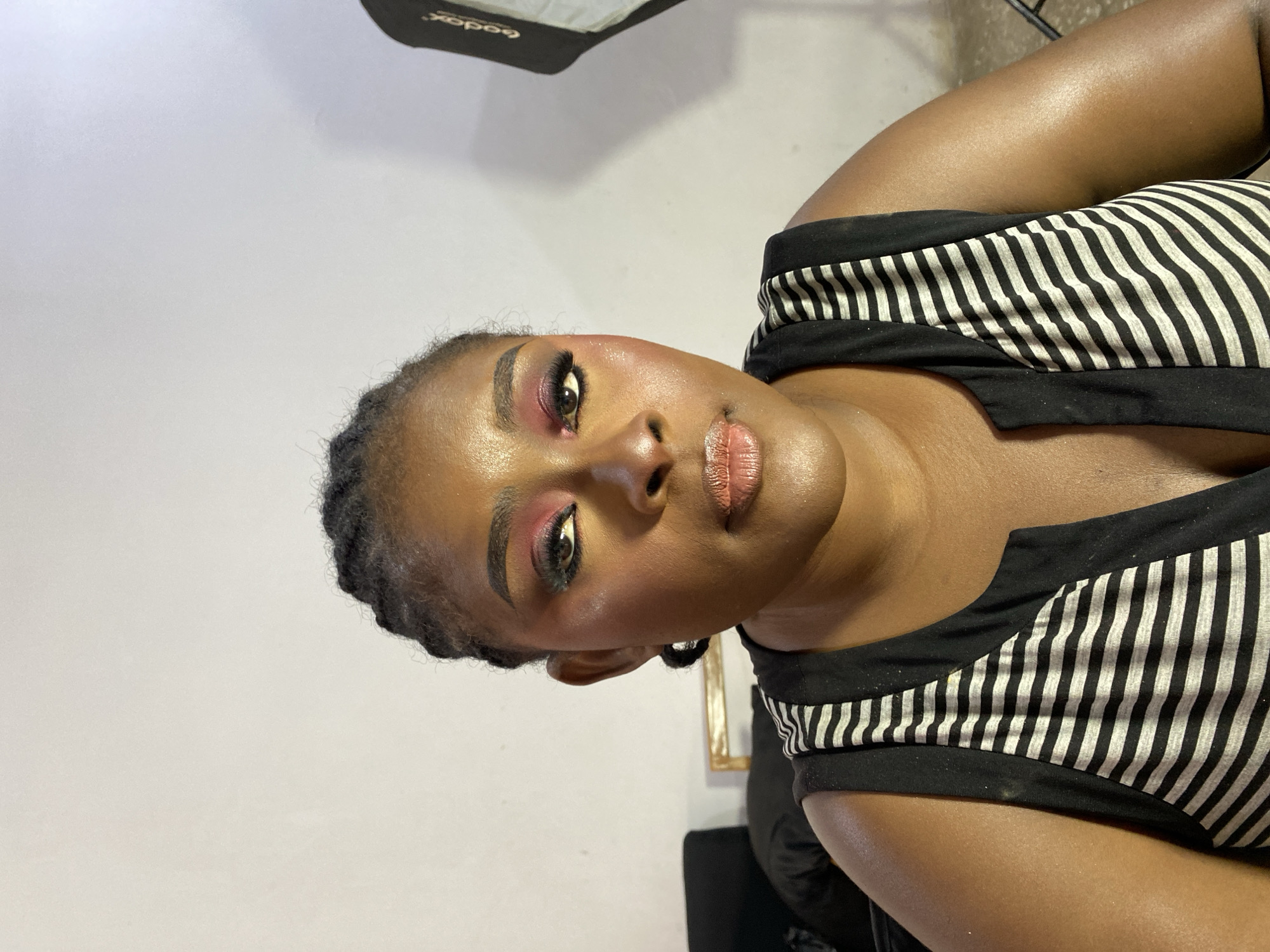 Makeup session documented in Gura Top, Nigeria