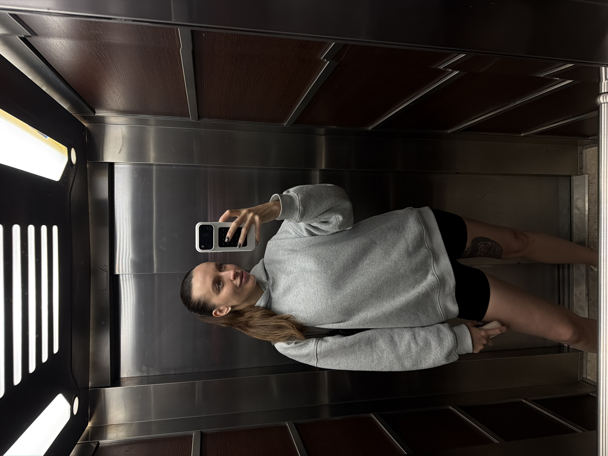 Woman takes elevator selfie in Budva, Montenegro
