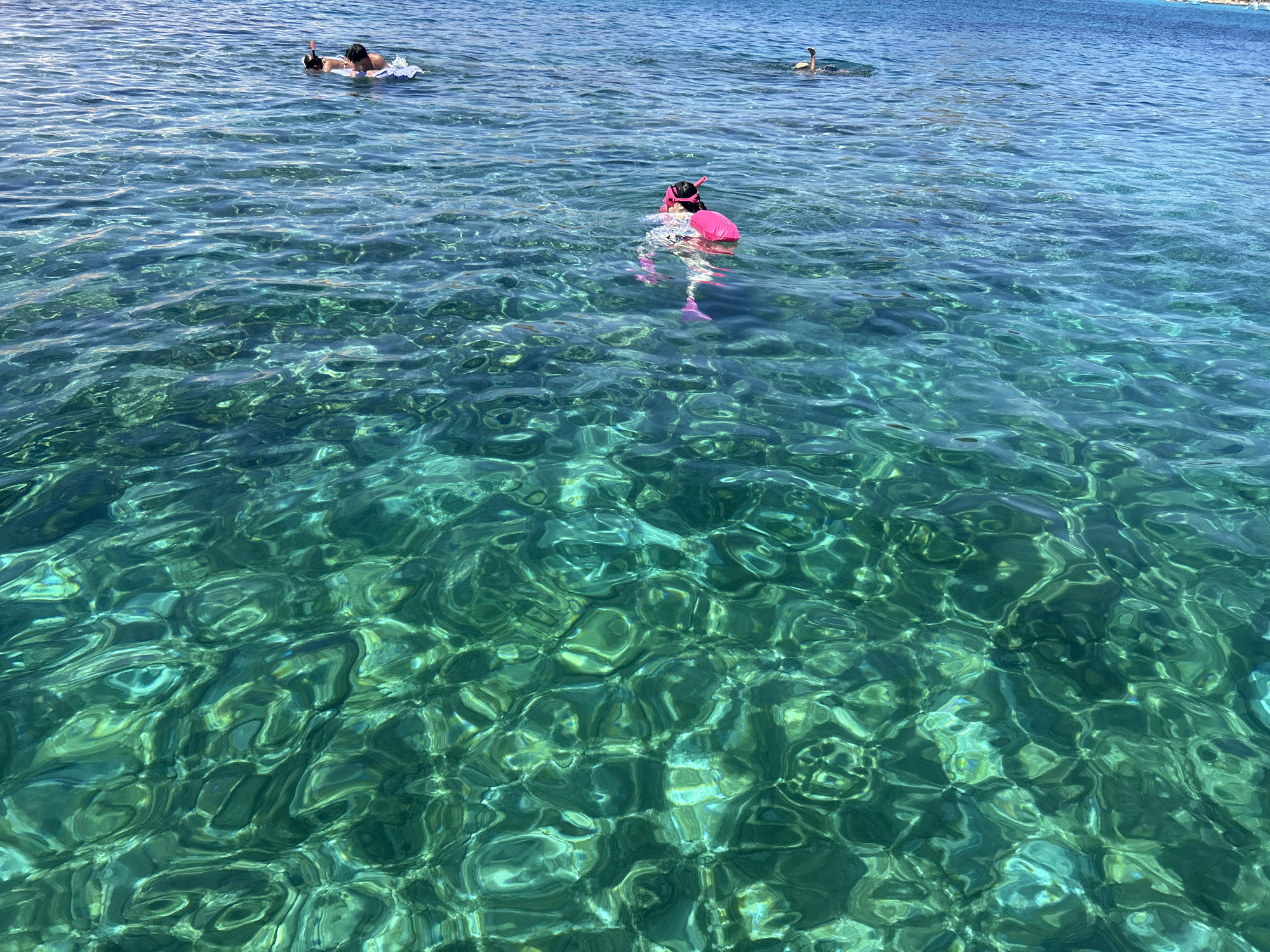 Snorkeling and shoreline scenes at Cala Lliteres, Mallorca