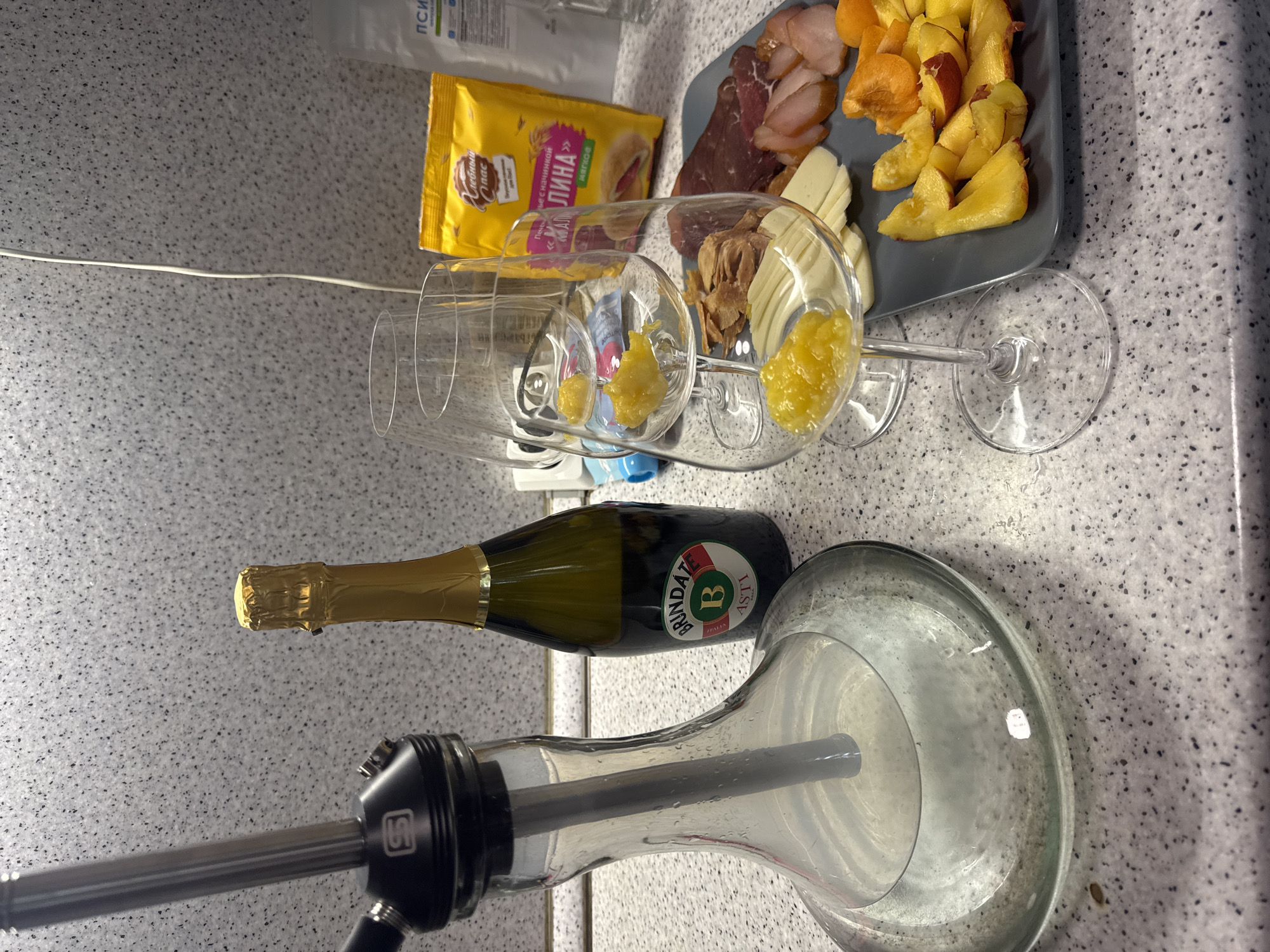 Hookah and bottle spotted on apartment counter in Saint Petersburg
