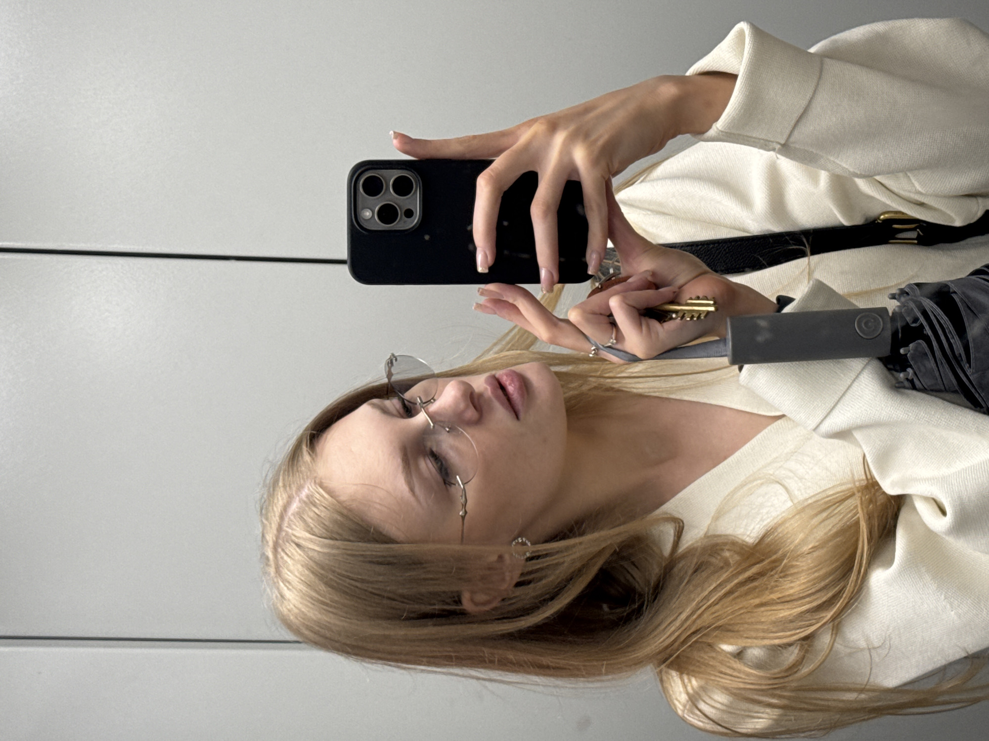 Elevator selfie with keys and phone, Perm, Russia