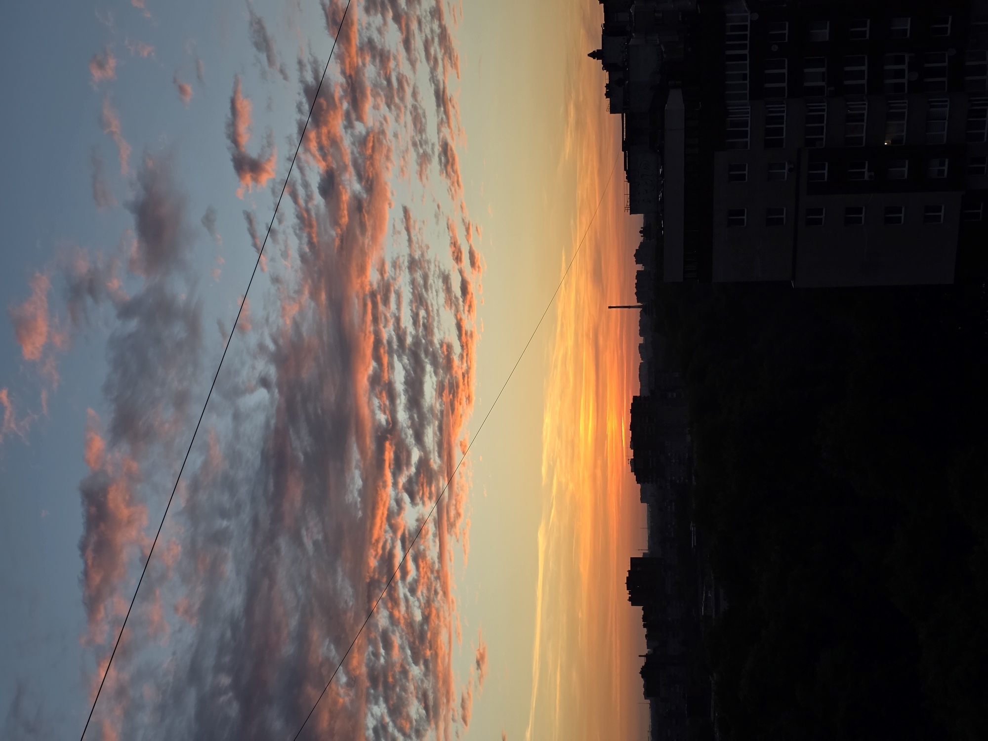 Dramatic sunset captured over Kaliningrad urban skyline