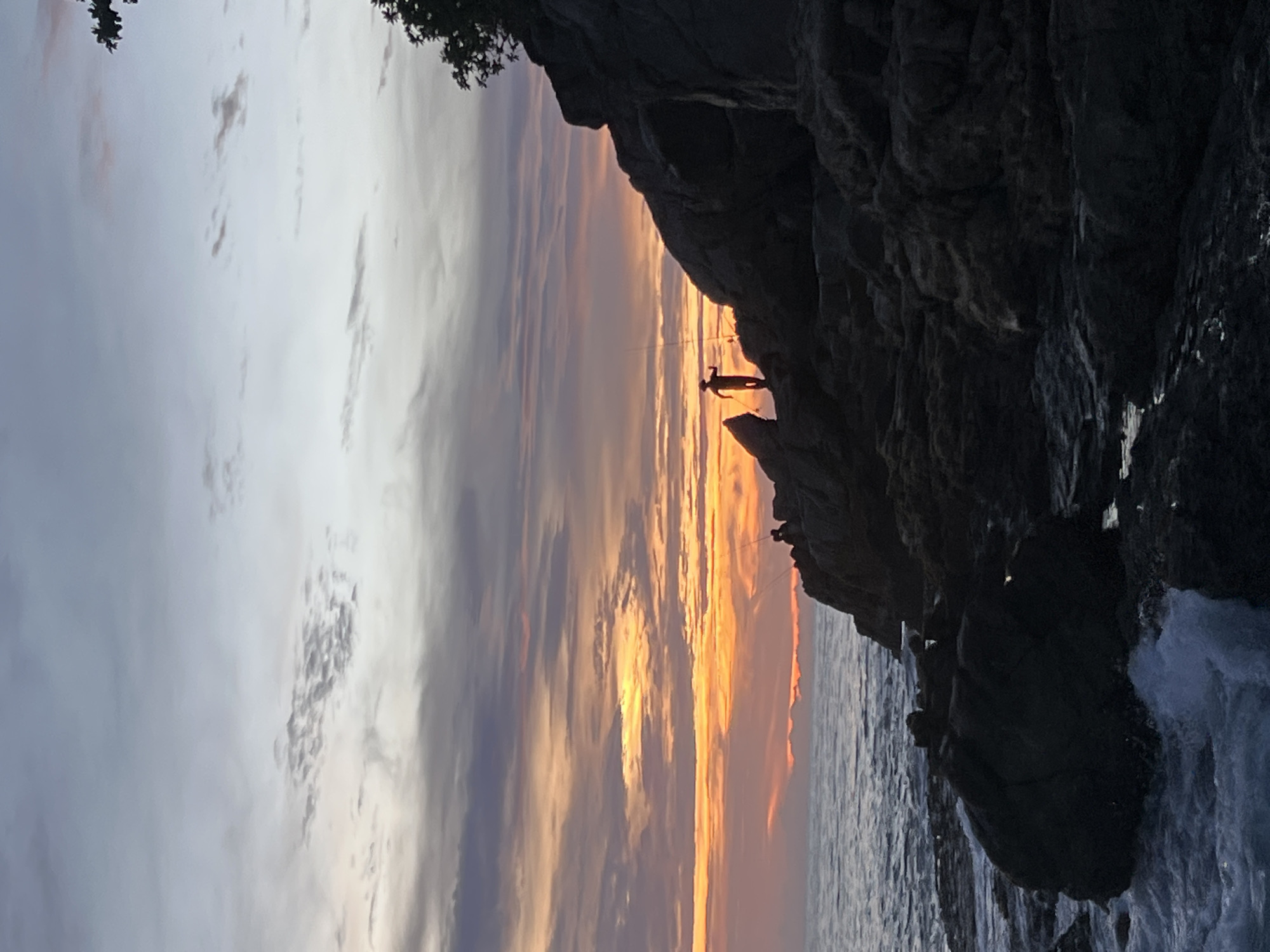 Sunset on the rocks at Choeng Thale's coastline
